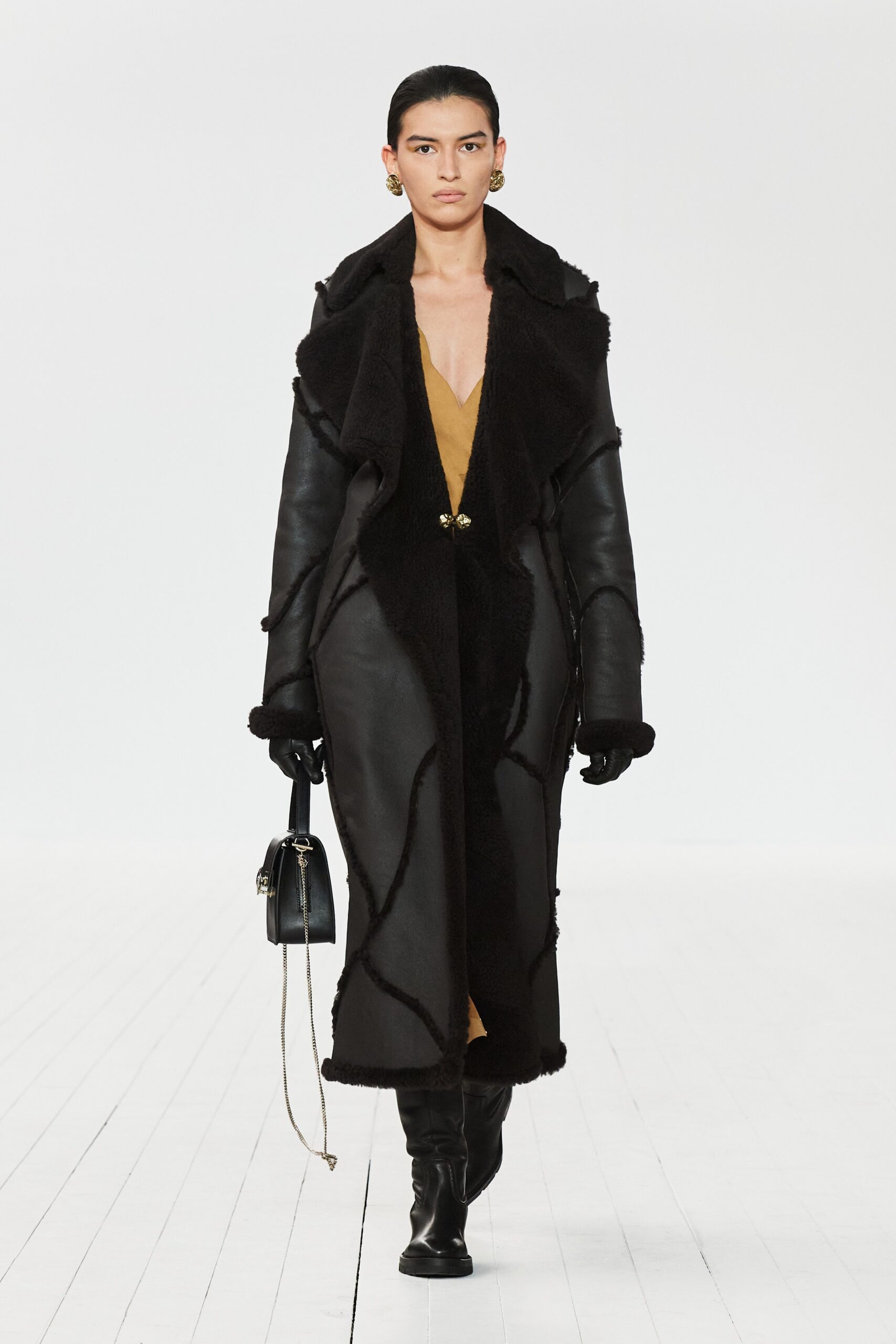 black shearling long-sleeve collared longline fur-trimmed textured coat