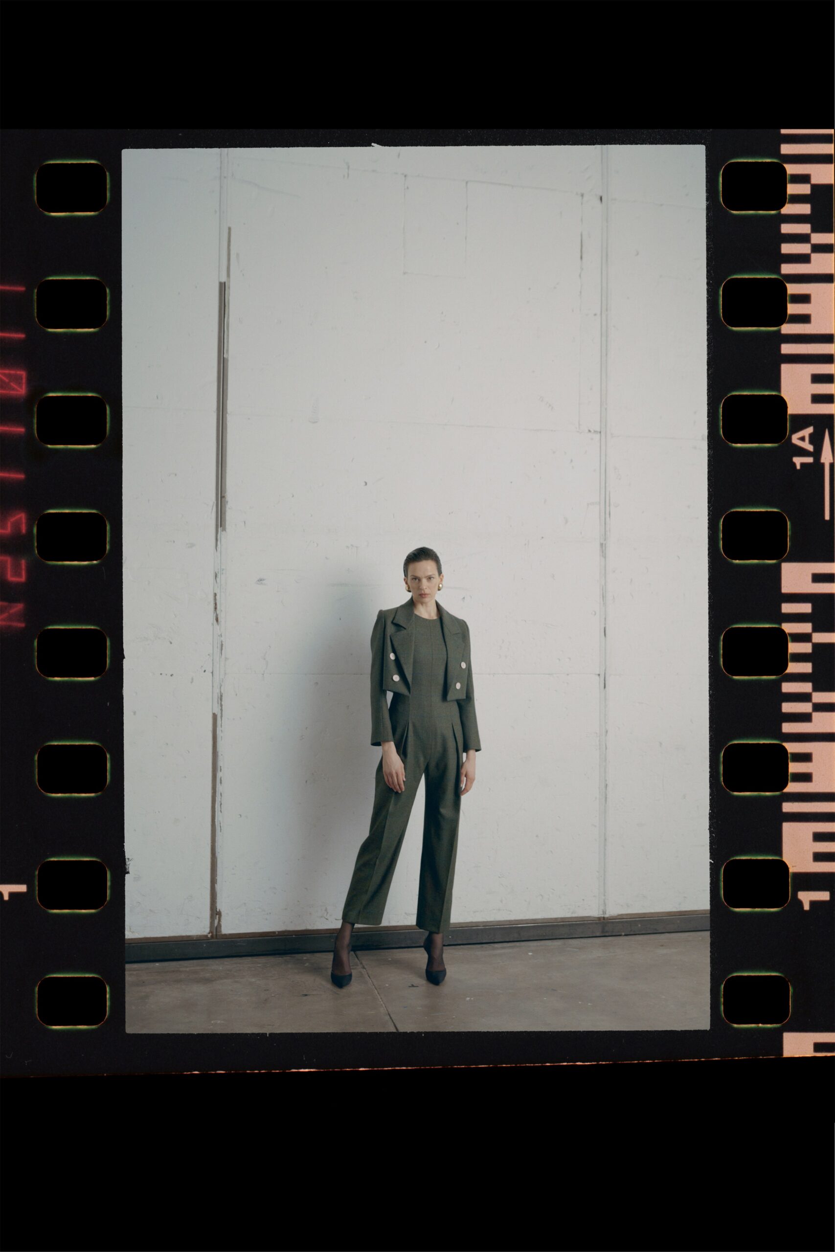 olive cutout jumpsuit with cropped jacket