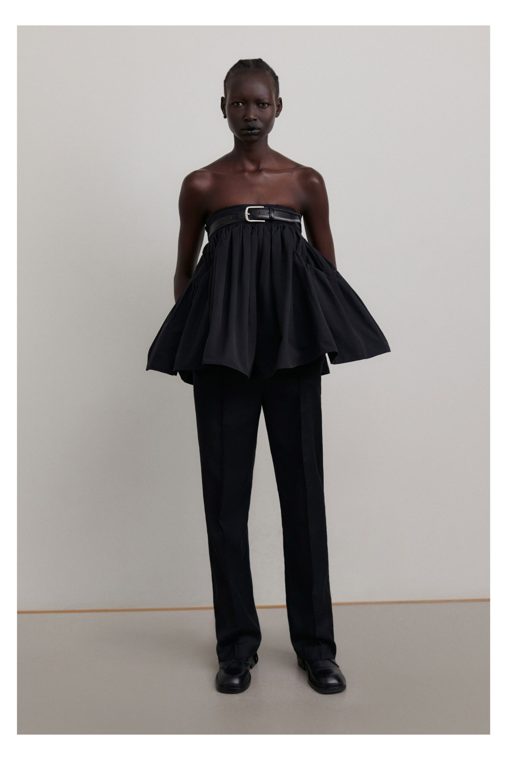 black unknown strapless draped belted flowing top