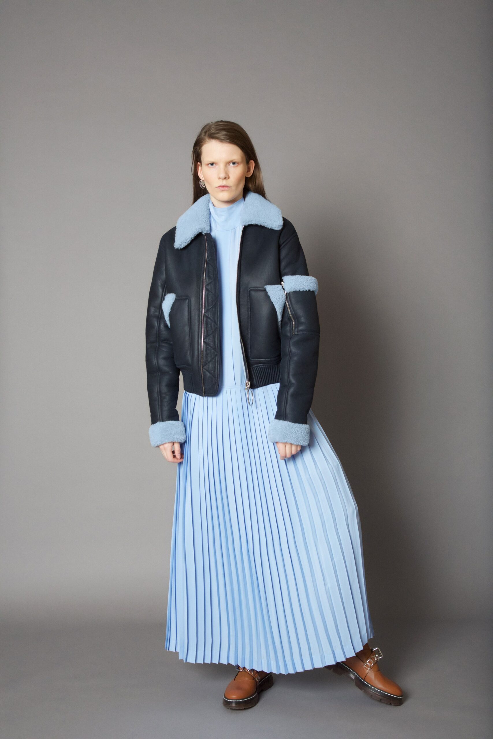 black leather long-sleeve collared relaxed zippered pockets jacket