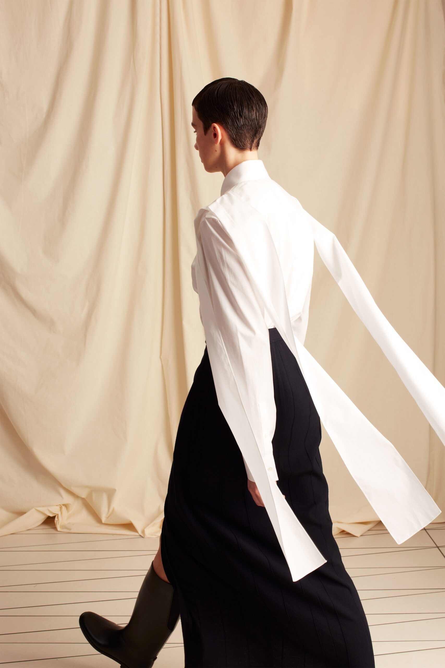 white shirt with trailing scarf panels