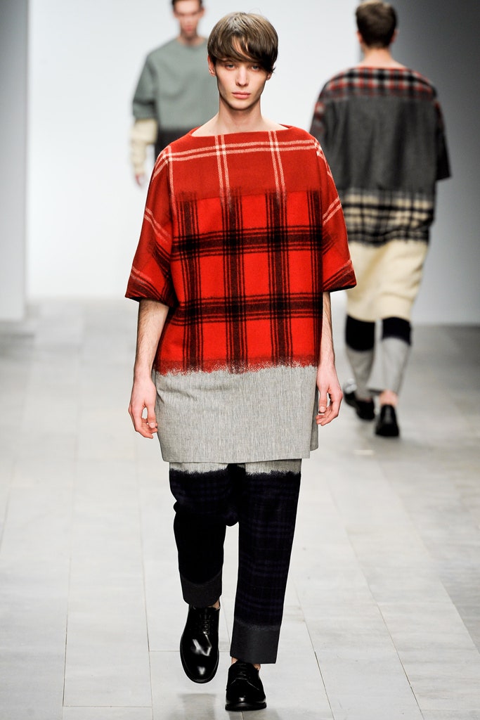 red plaid poncho-style tunic top