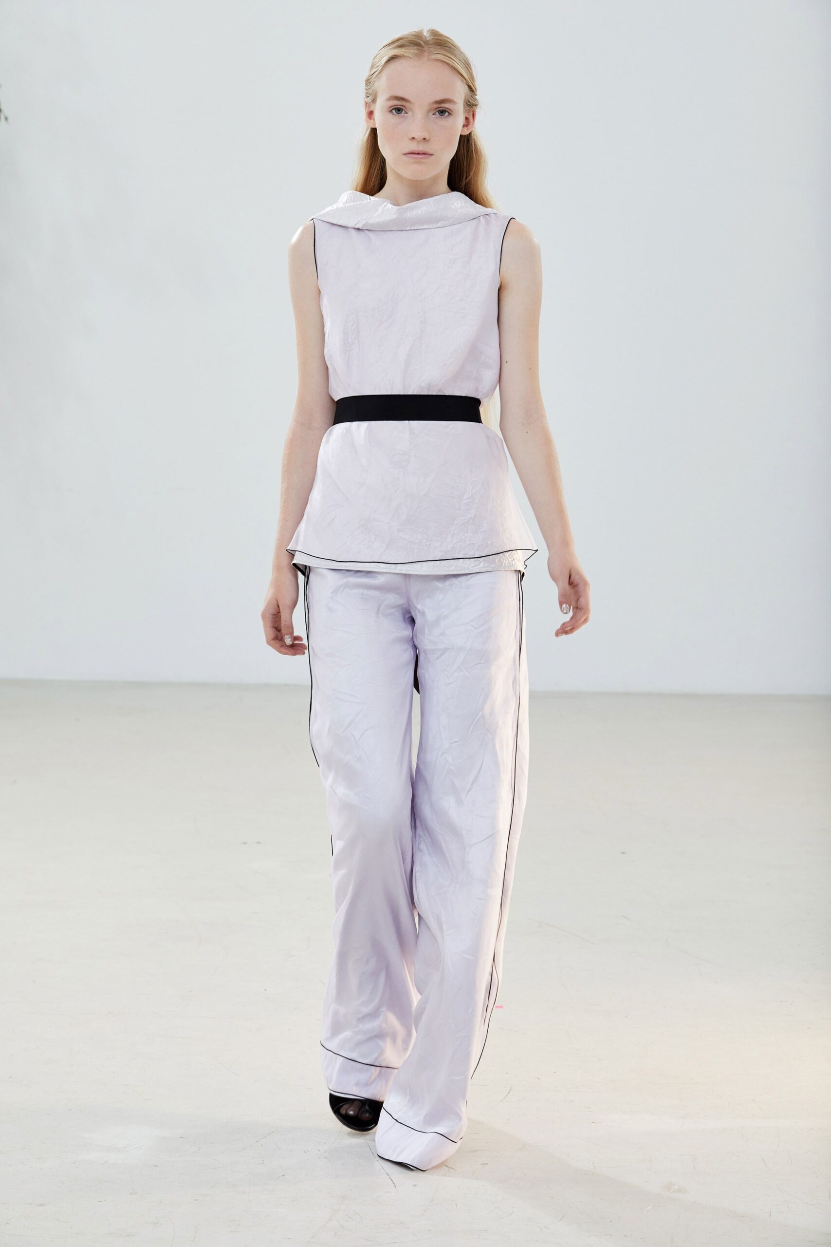 piped sleeveless top and wide-leg trousers