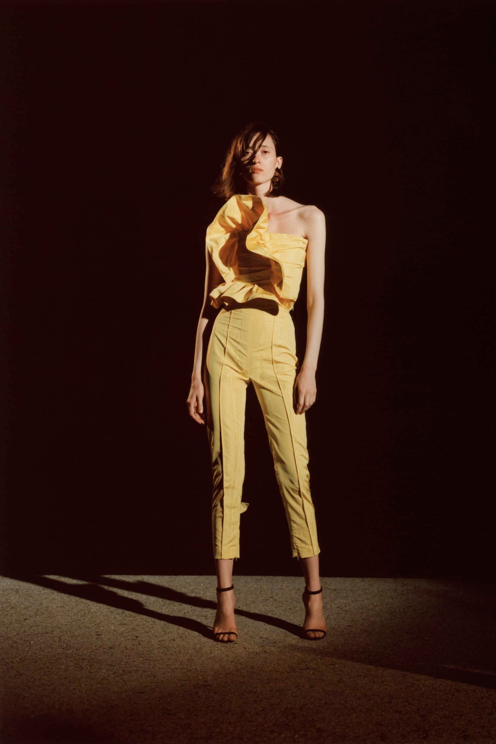 sculptural one-shoulder yellow peplum top