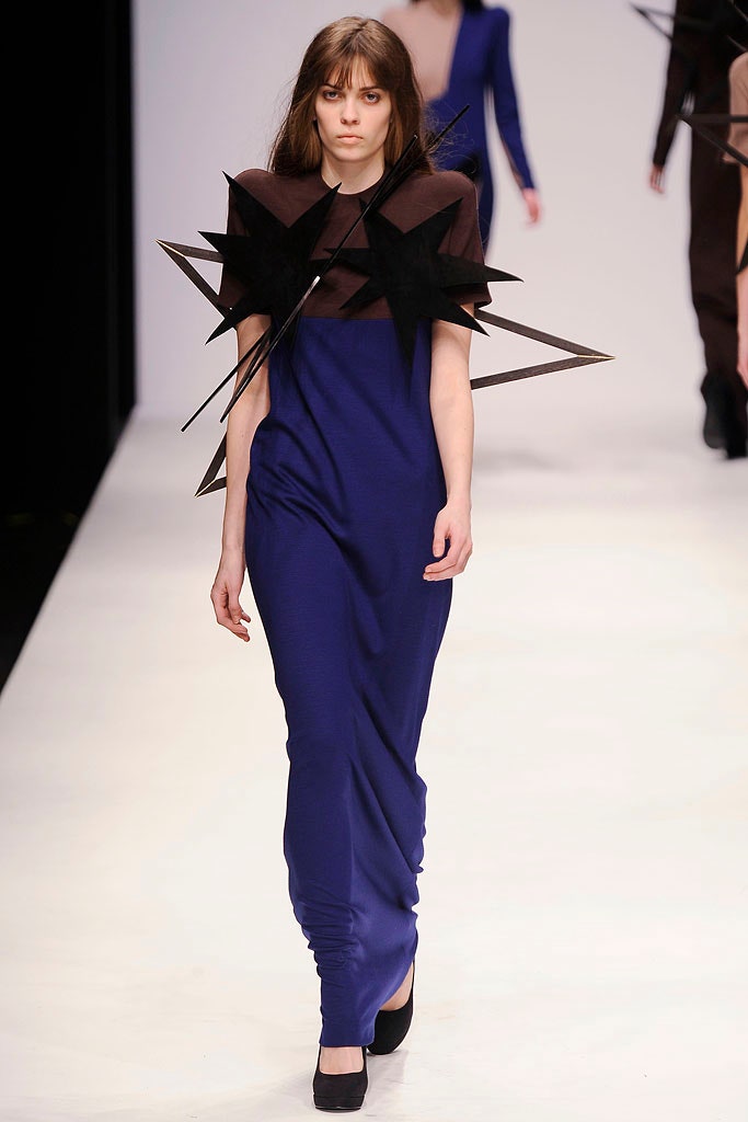 blue evening gown with sculptural appliqué