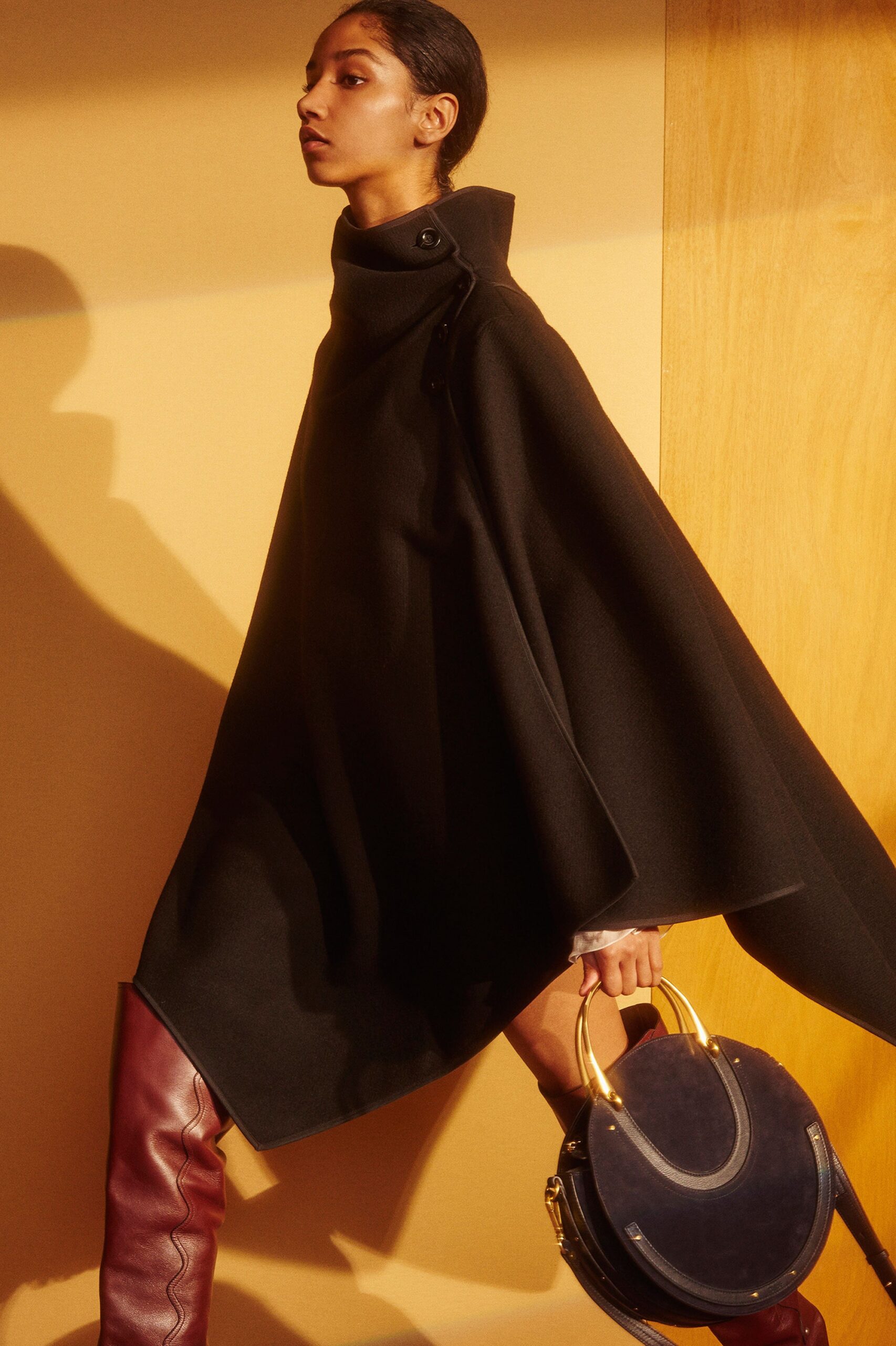 black wool high-neck asymmetric oversized buttoned midi cape