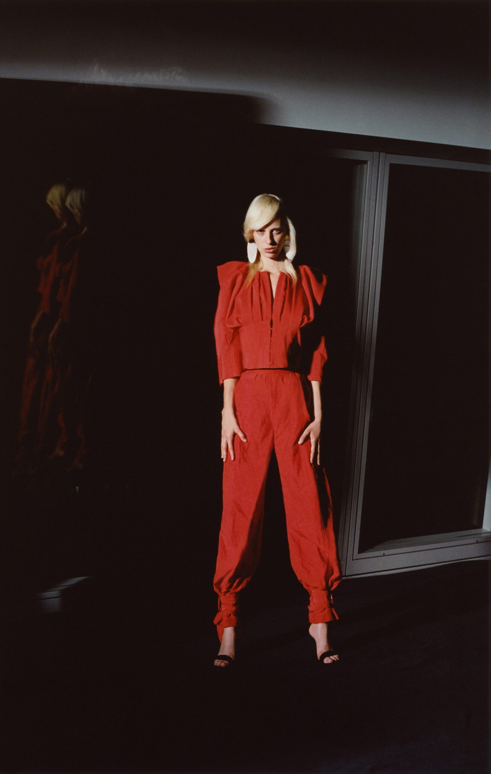 red puff-shoulder jumpsuit