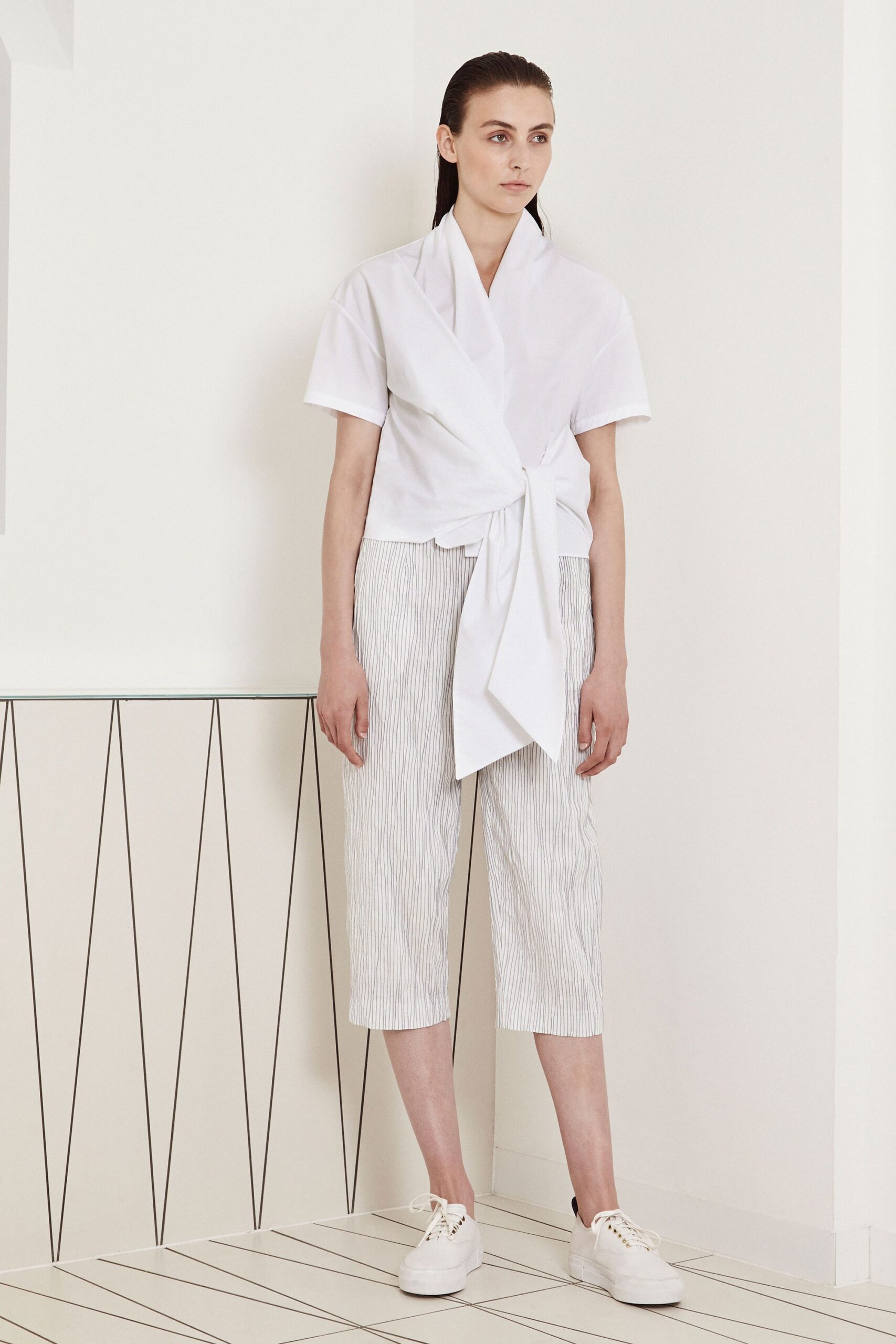 white wrap blouse with tie detail