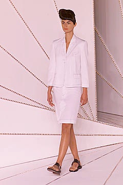 white skirt suit with flat sandals