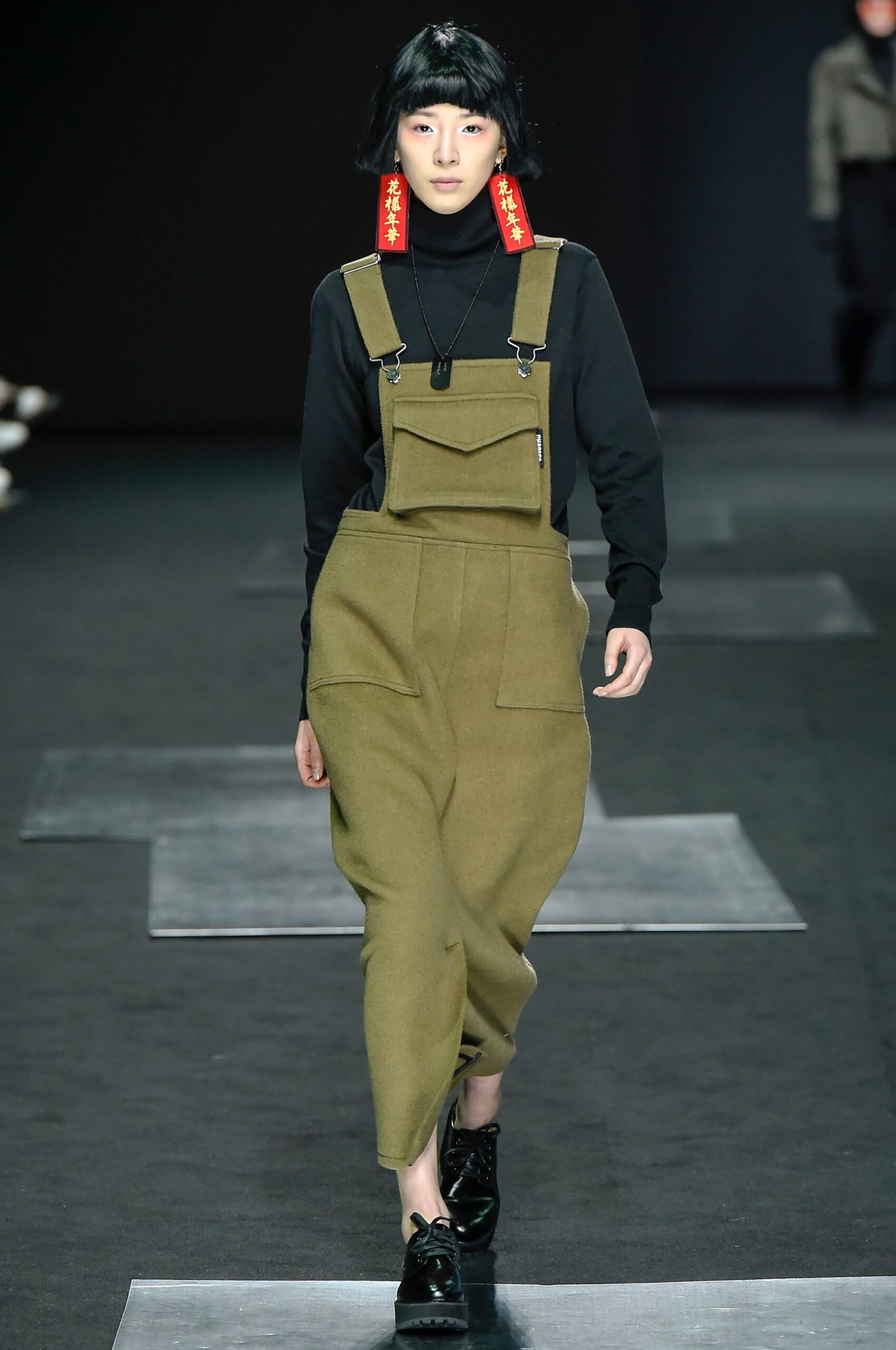 olive bib-front jumpsuit