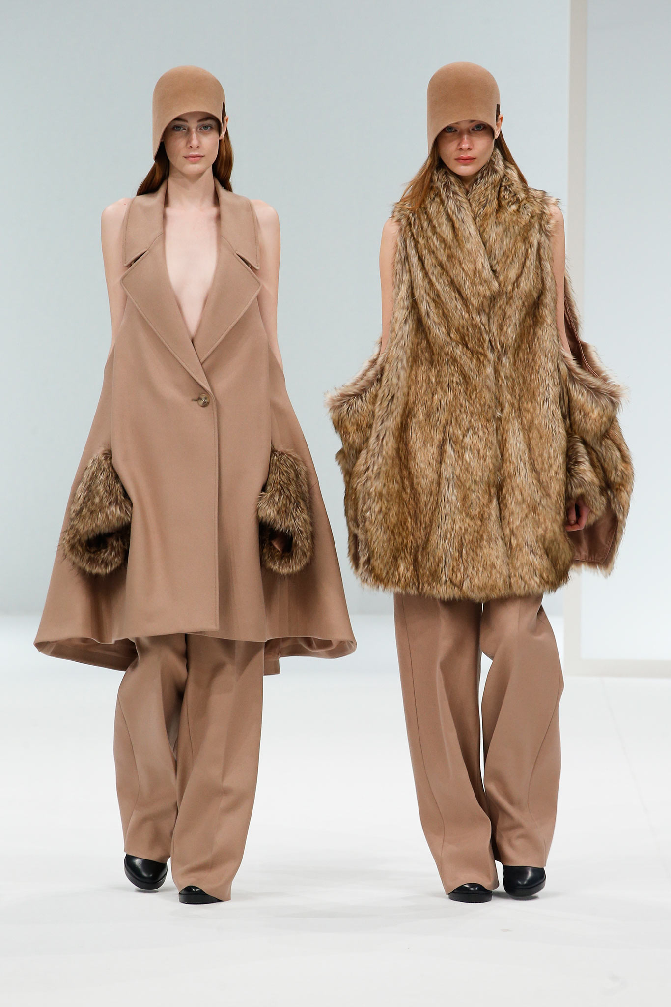 fur-trimmed camel cape coat