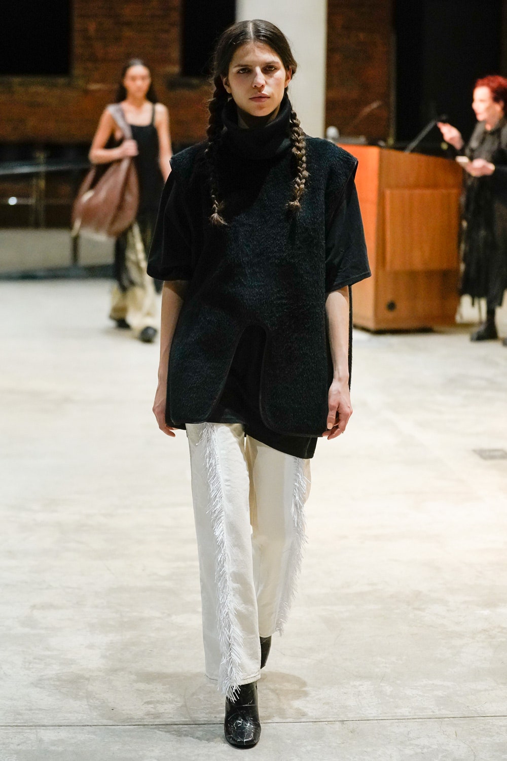 black textured tunic vest