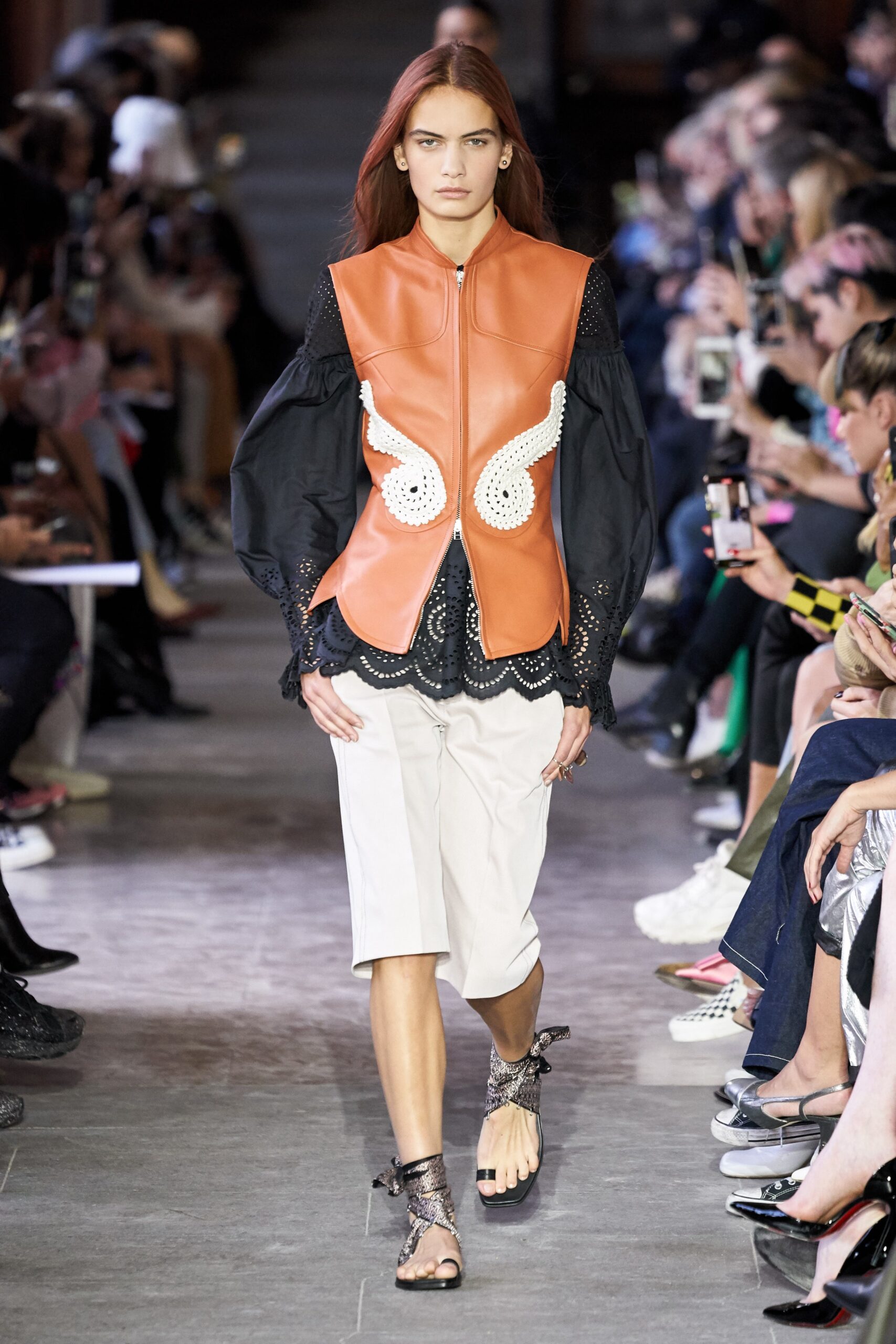 orange leather sleeveless high-neck structured zippered openwork jacket