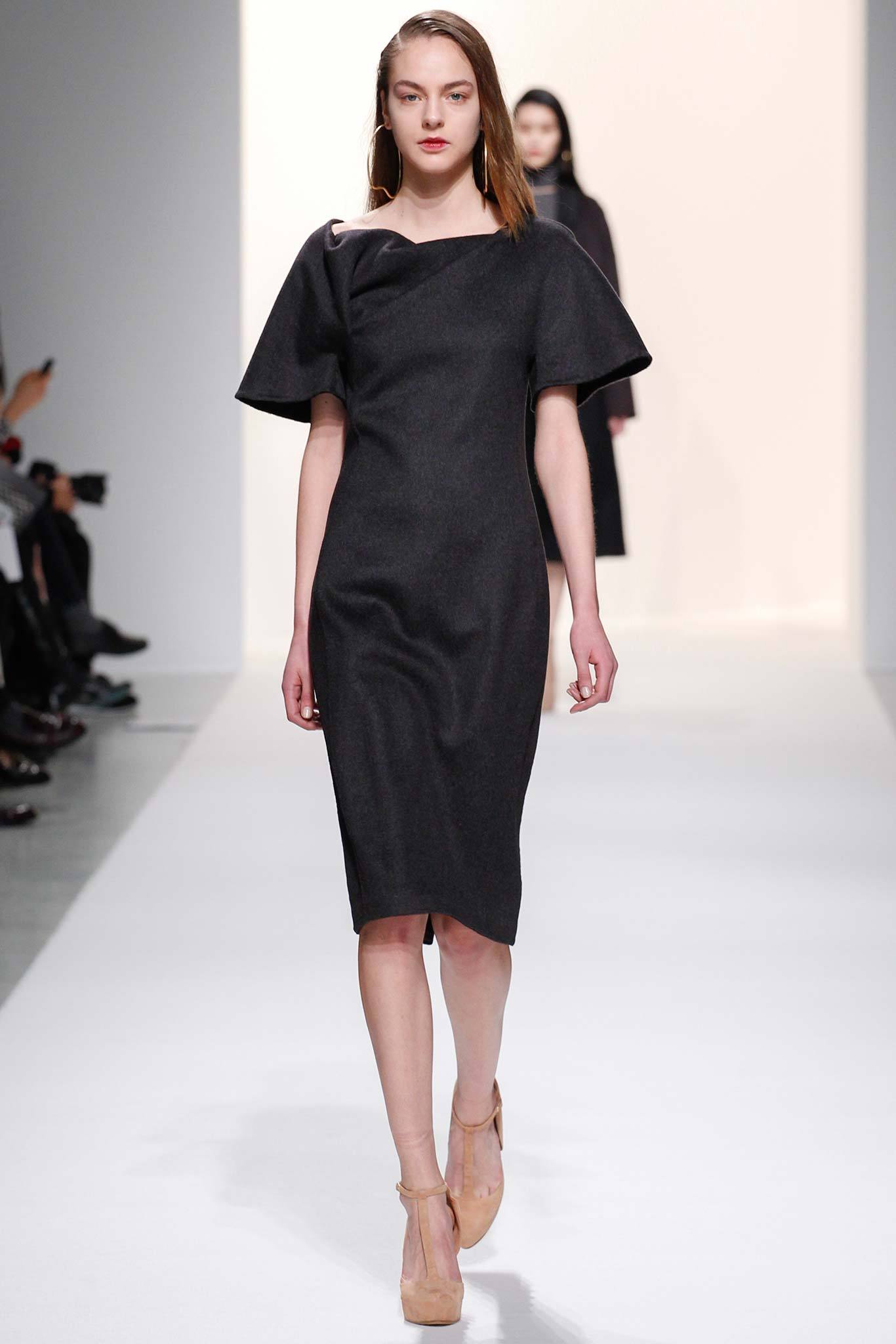 asymmetric black cape-sleeve midi dress