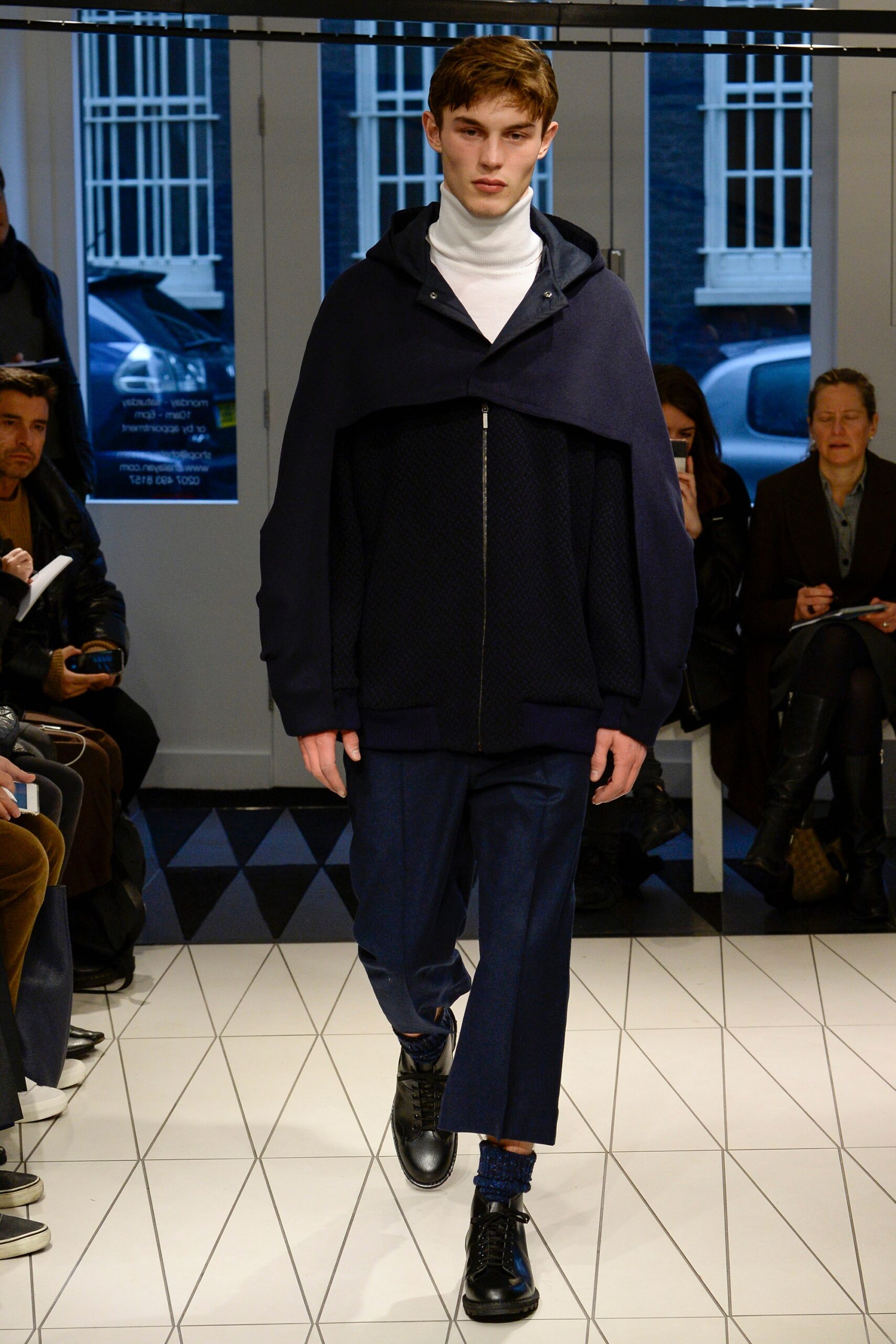 hooded shoulder cape over turtleneck
