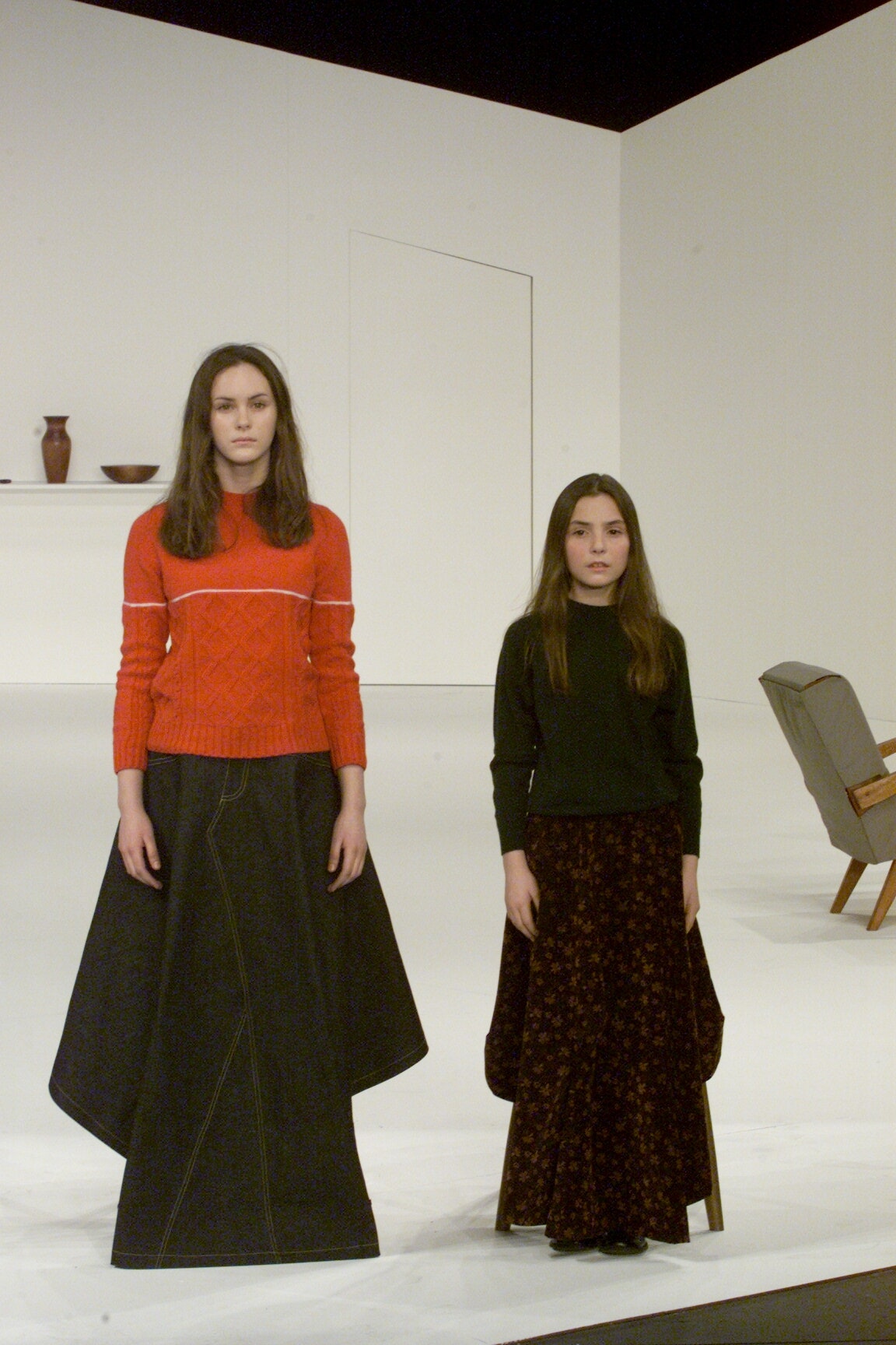 red cable-knit sweater