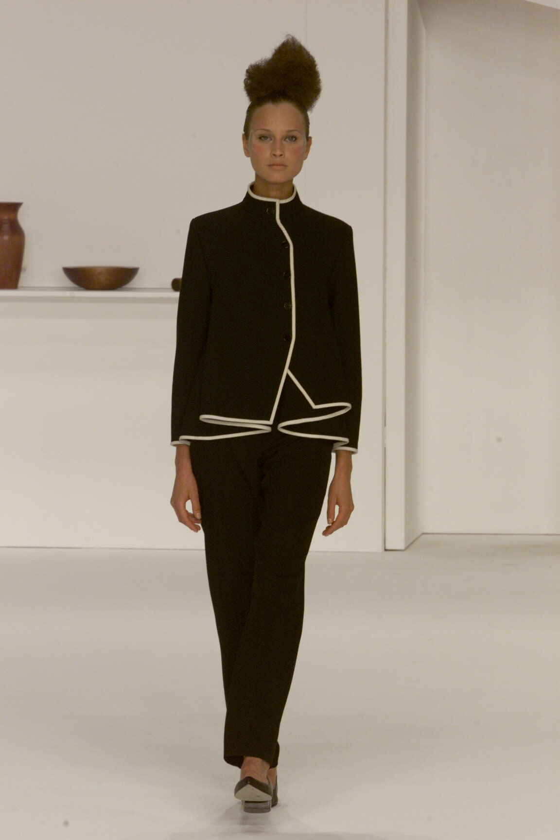 black jacket with white piping
