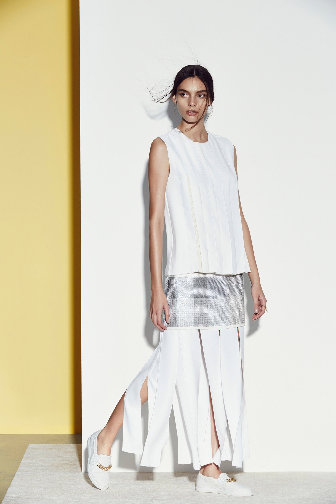 white pleated sleeveless top