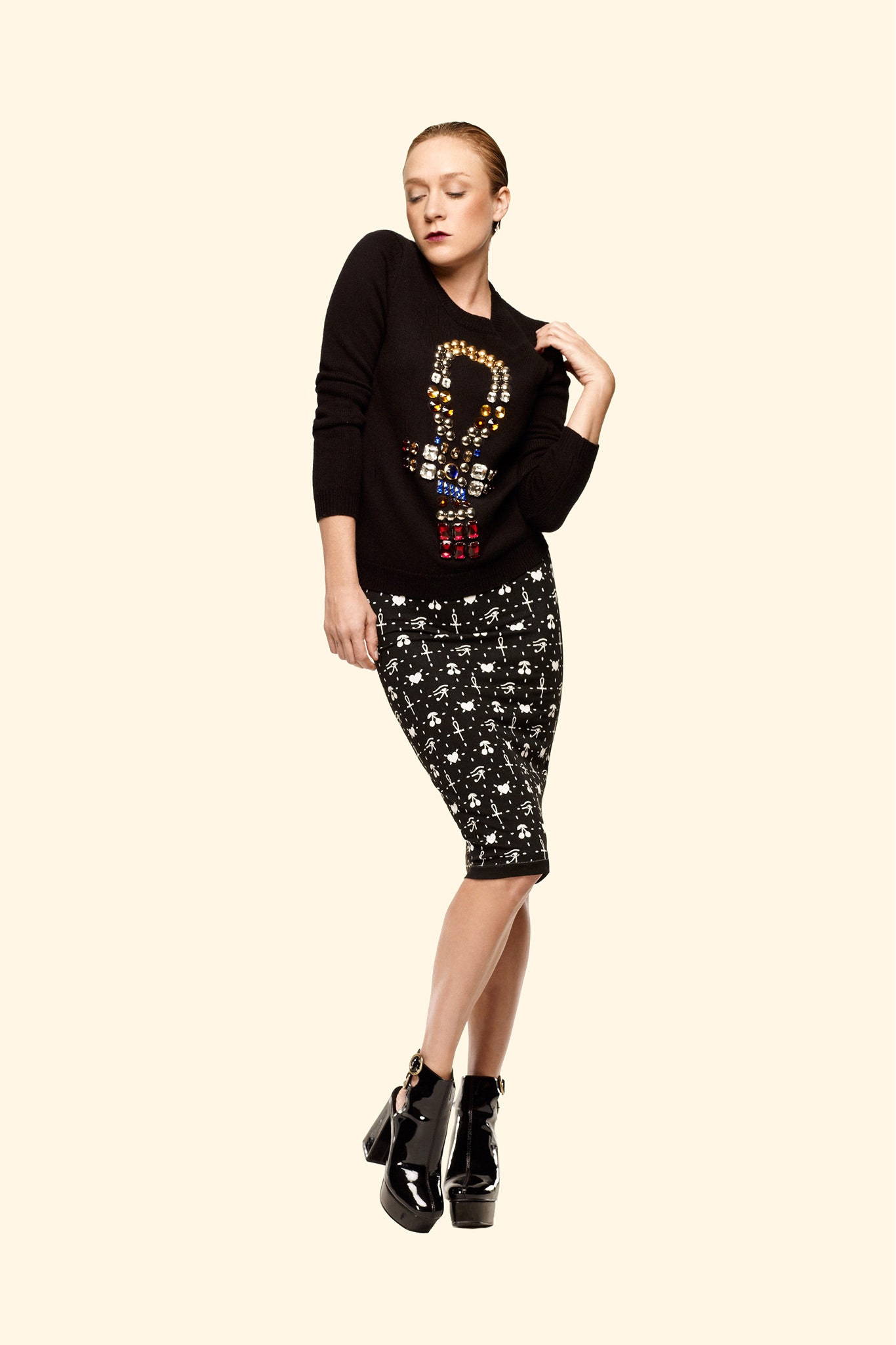 black embellished sweater with jewel motif