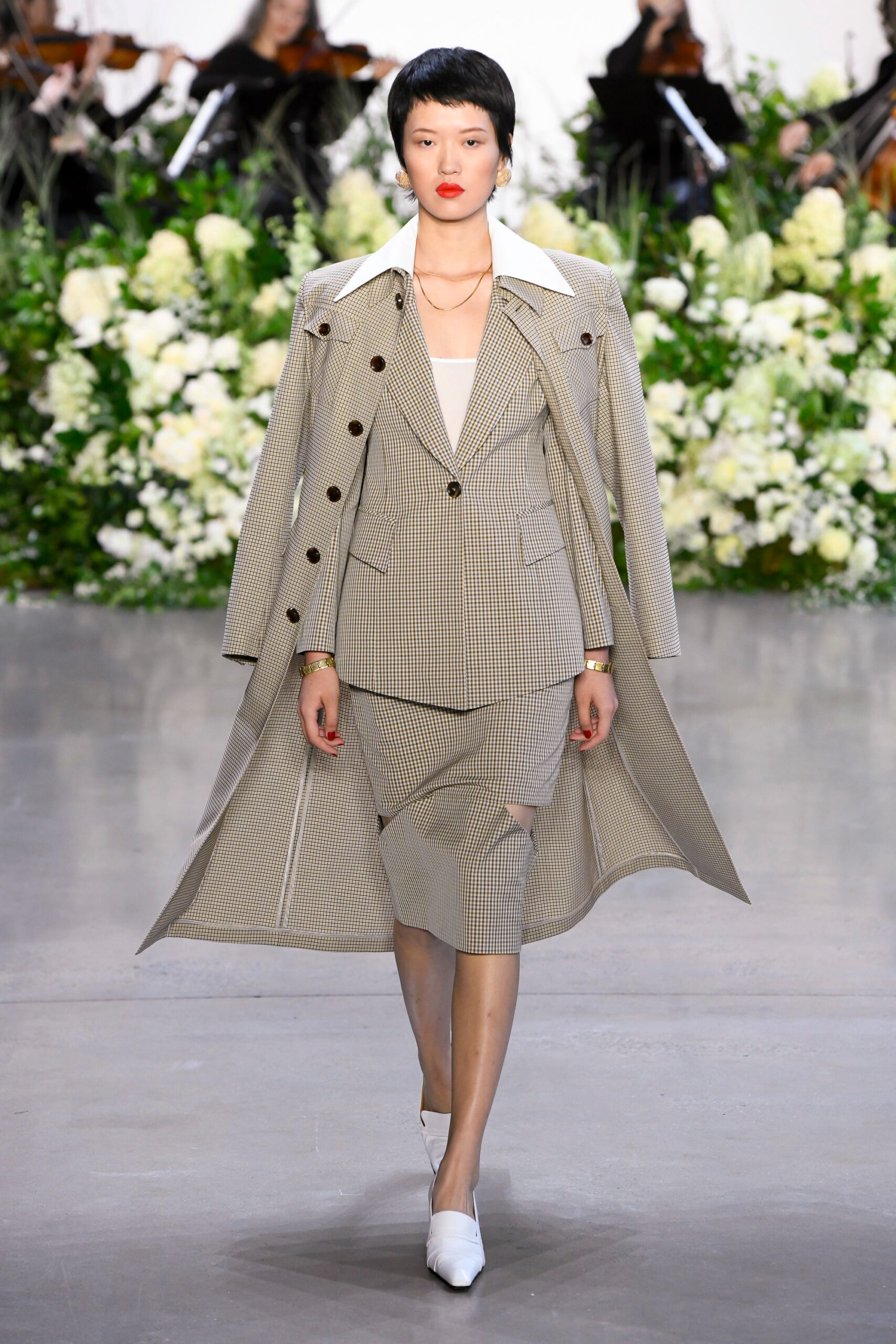 checked sleeveless blazer and skirt suit