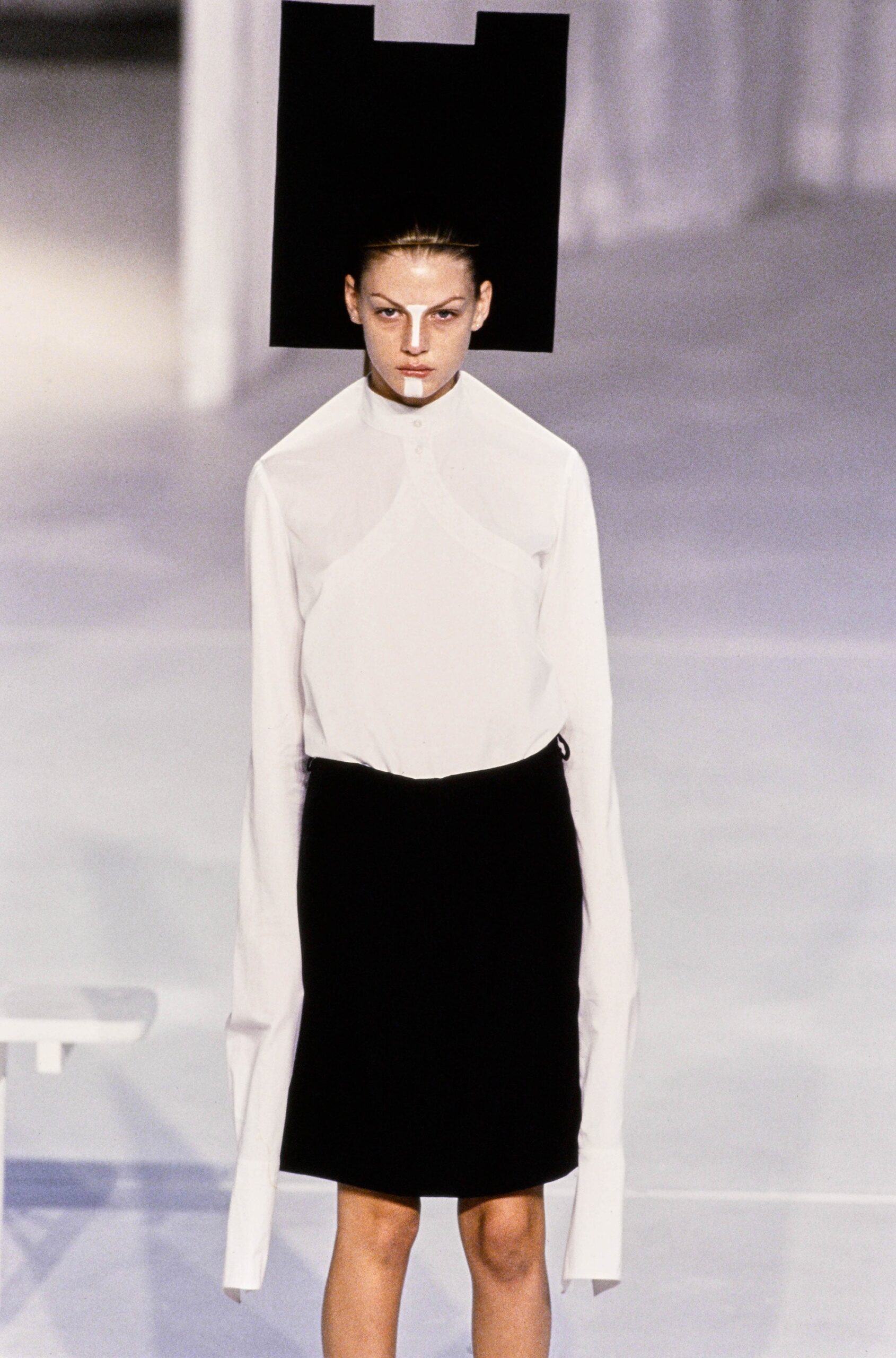 white draped high-neck blouse