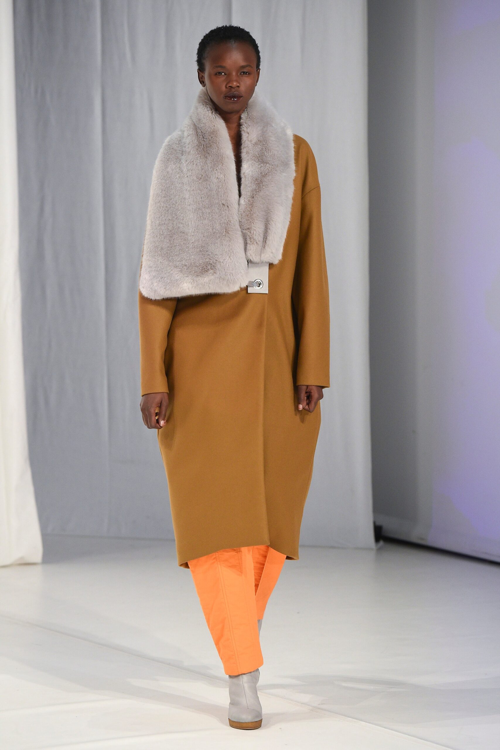 fur stole over cocoon coat