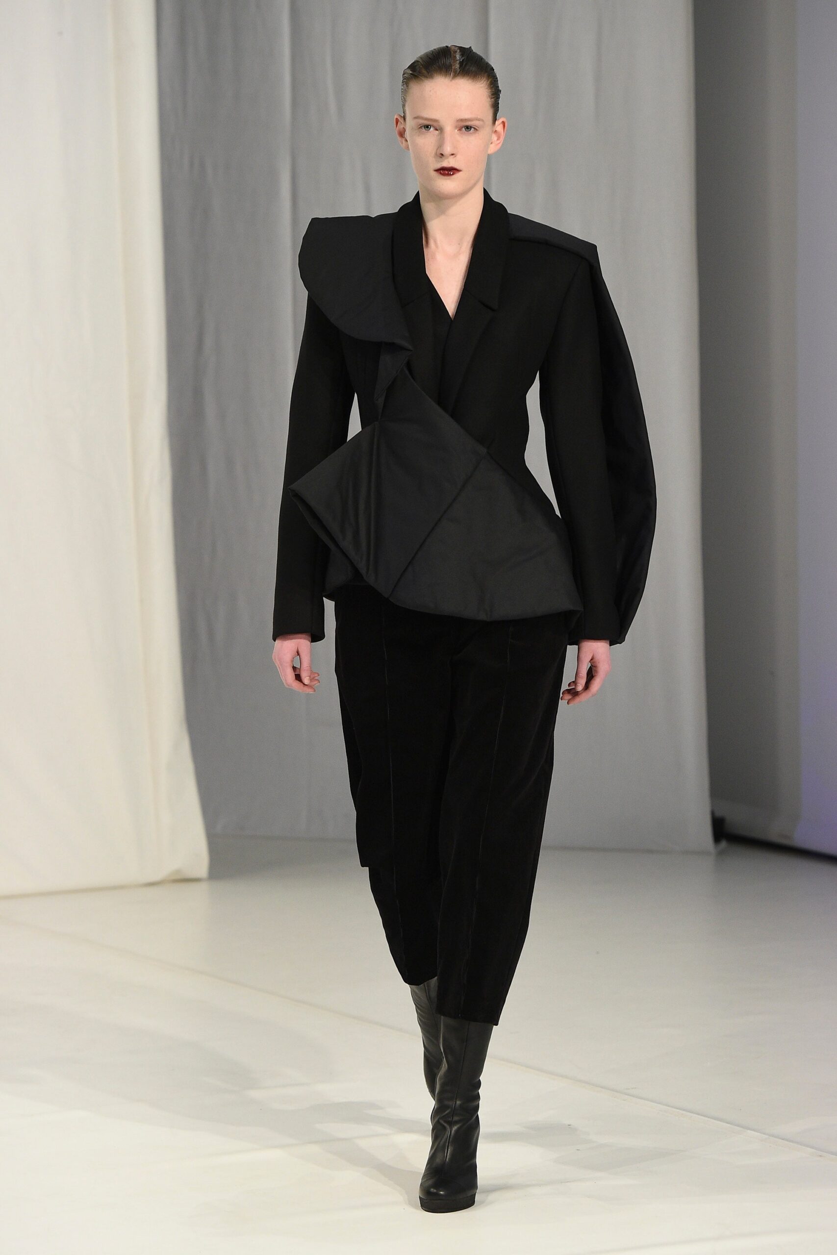 black sculptural peplum jacket