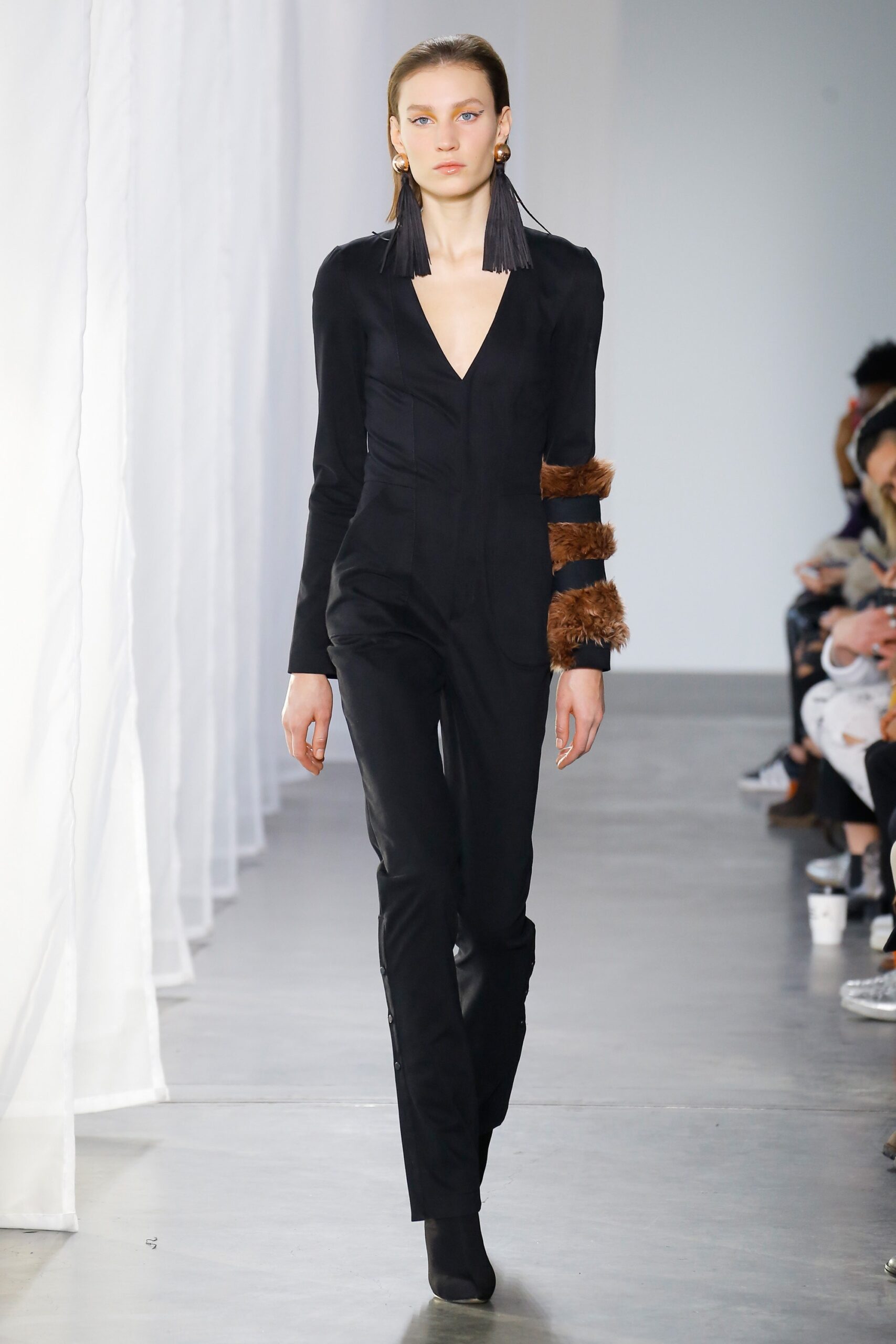 black fur-trimmed plunge jumpsuit