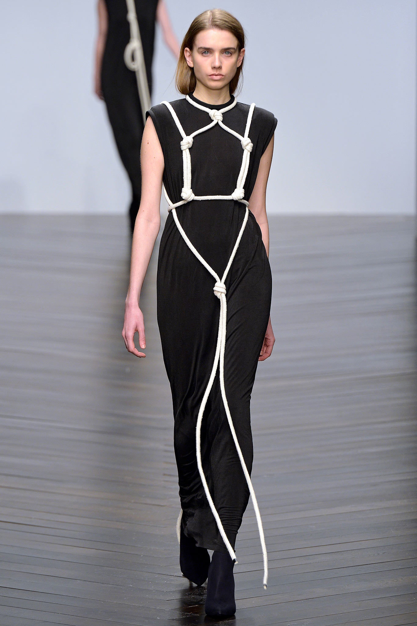 black draped maxi dress with rope harness