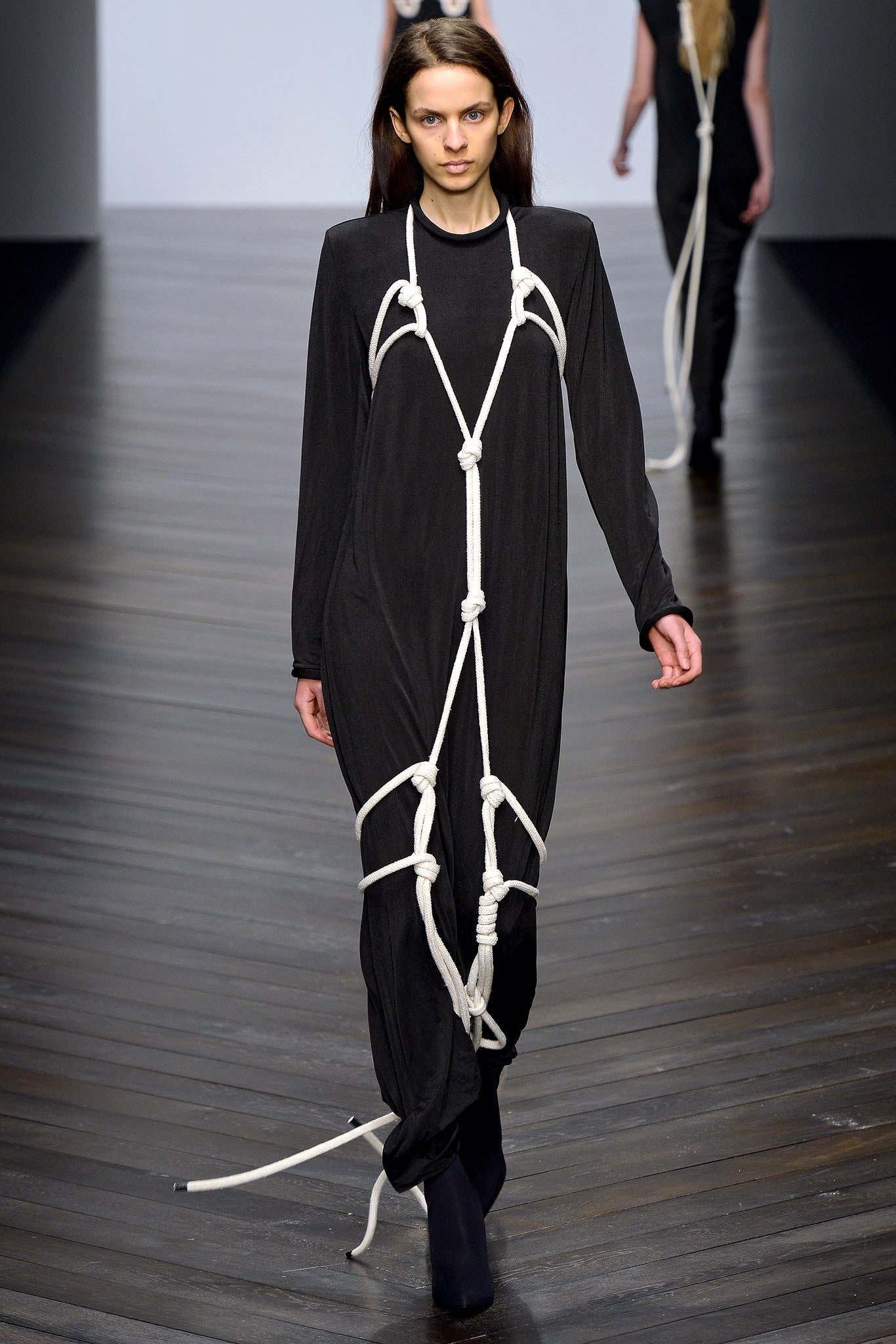 black draped maxi dress with rope harness