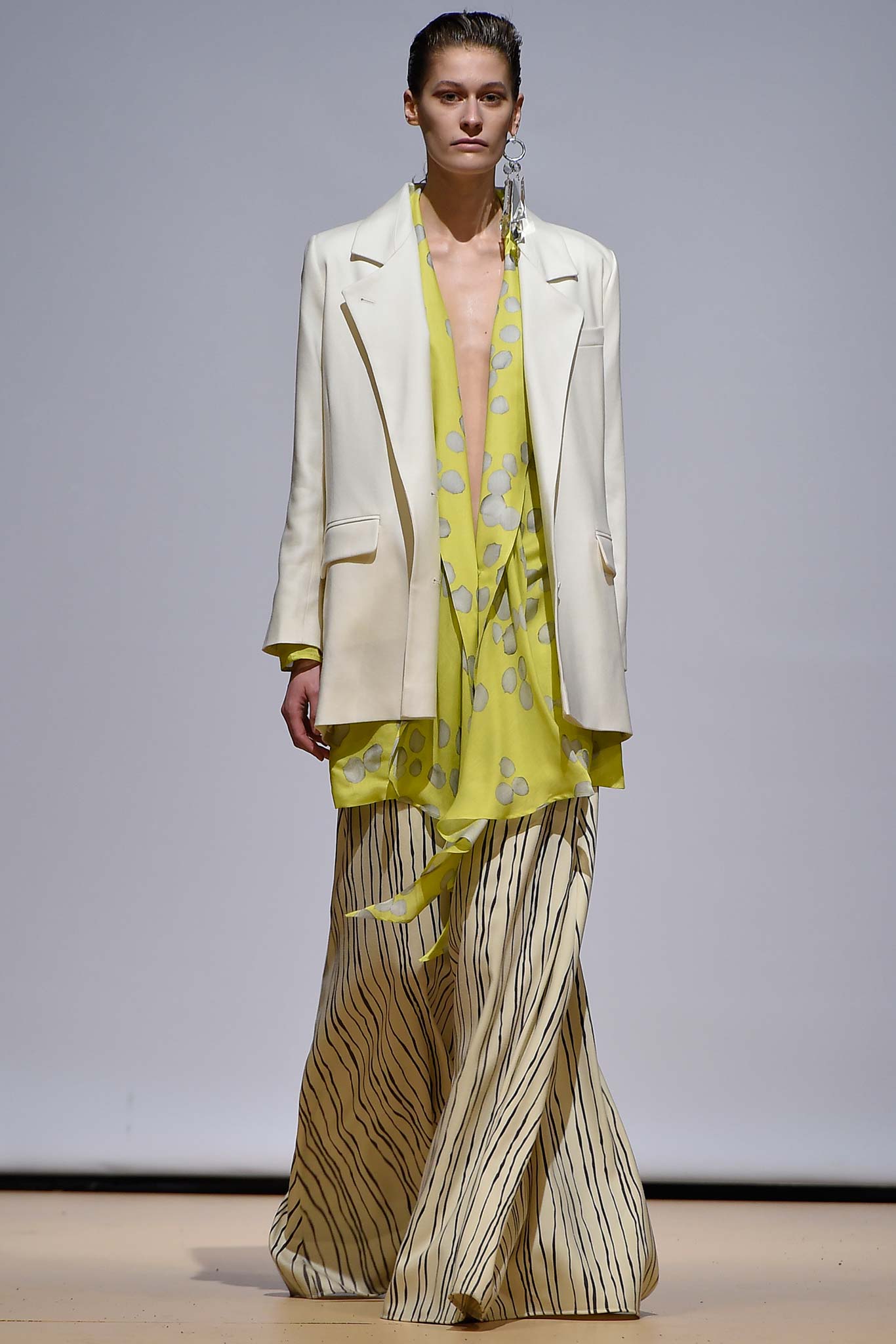 yellow polka-dot draped dress