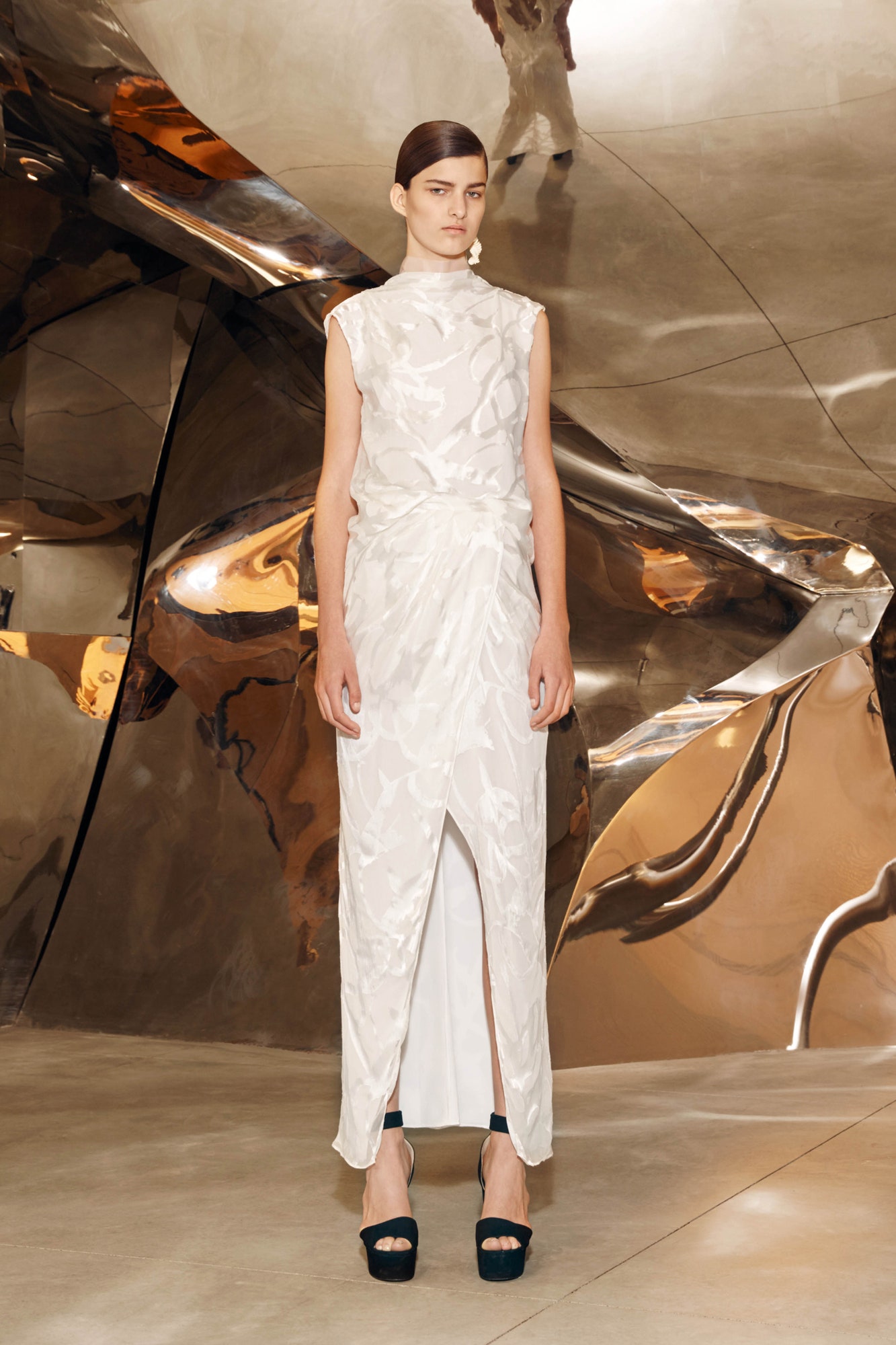 white appliqued high-neck evening gown