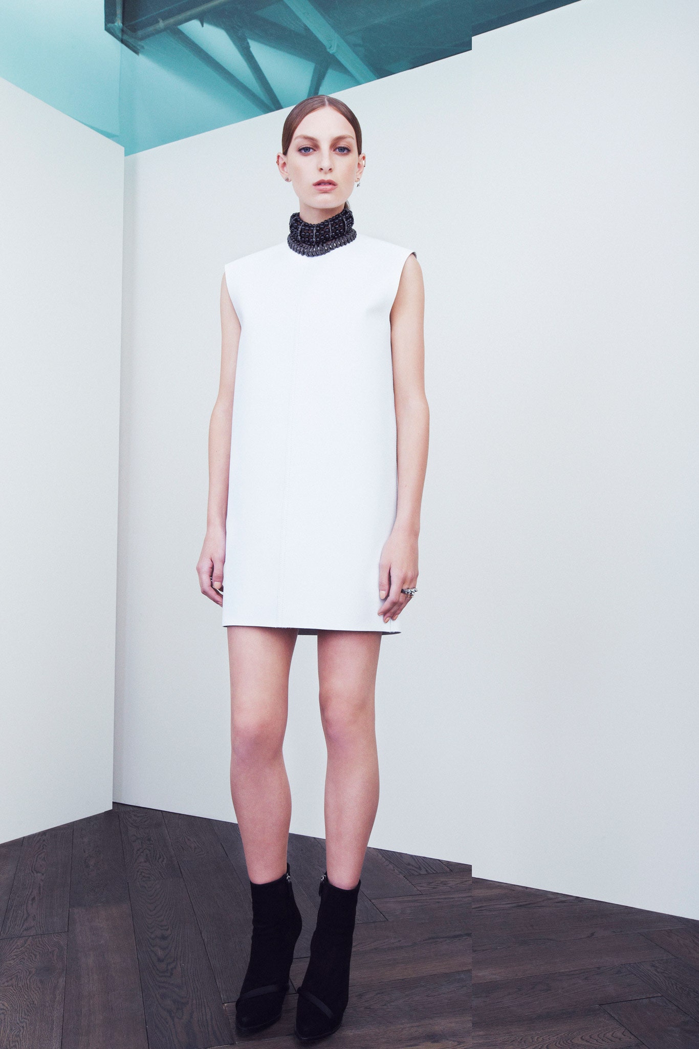 white sleeveless shift mini dress