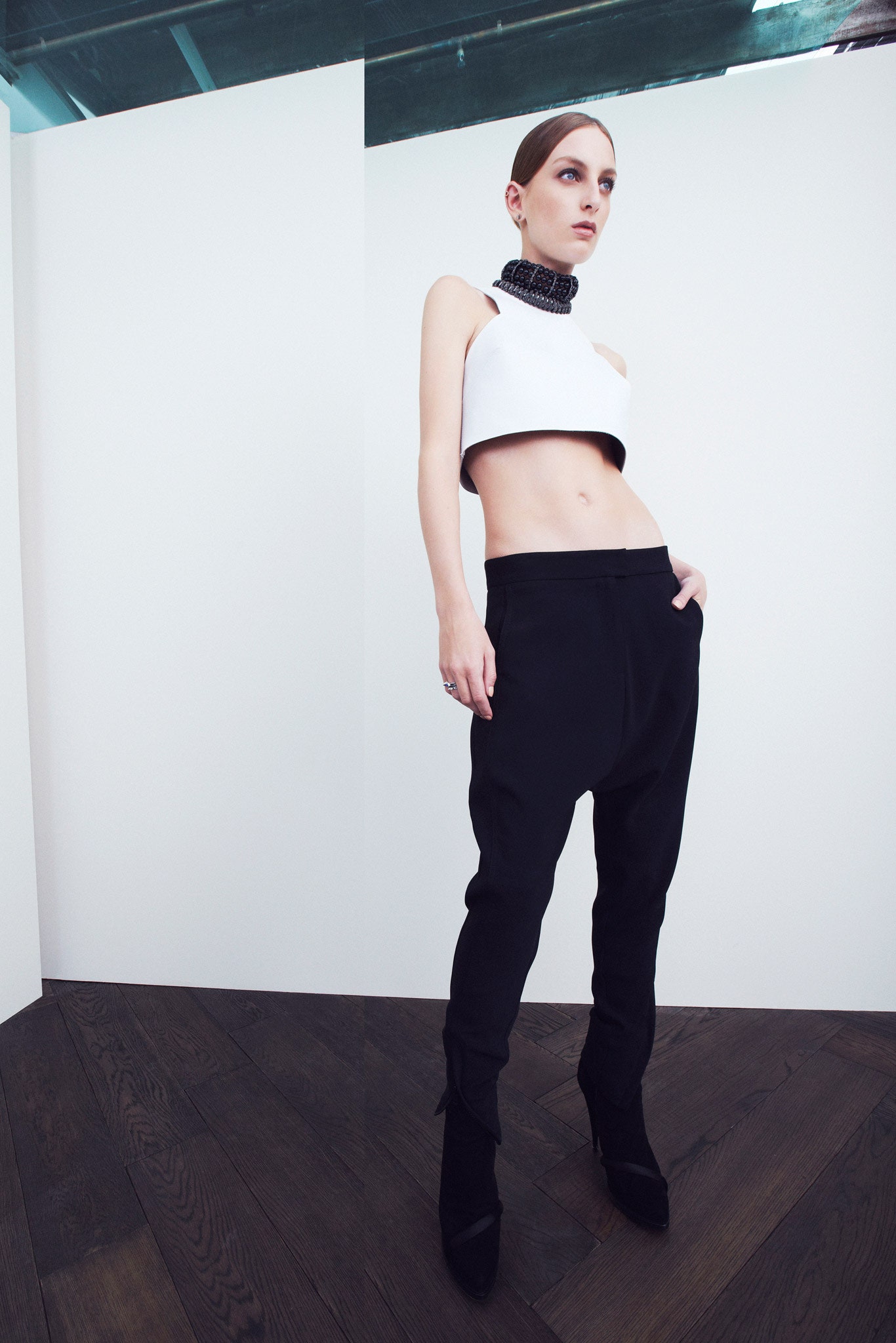 white sculptural high-neck crop top