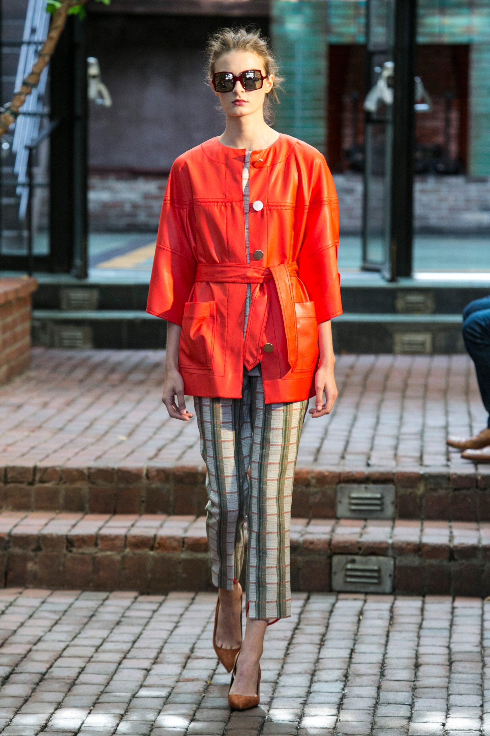 orange leather kimono-style jacket