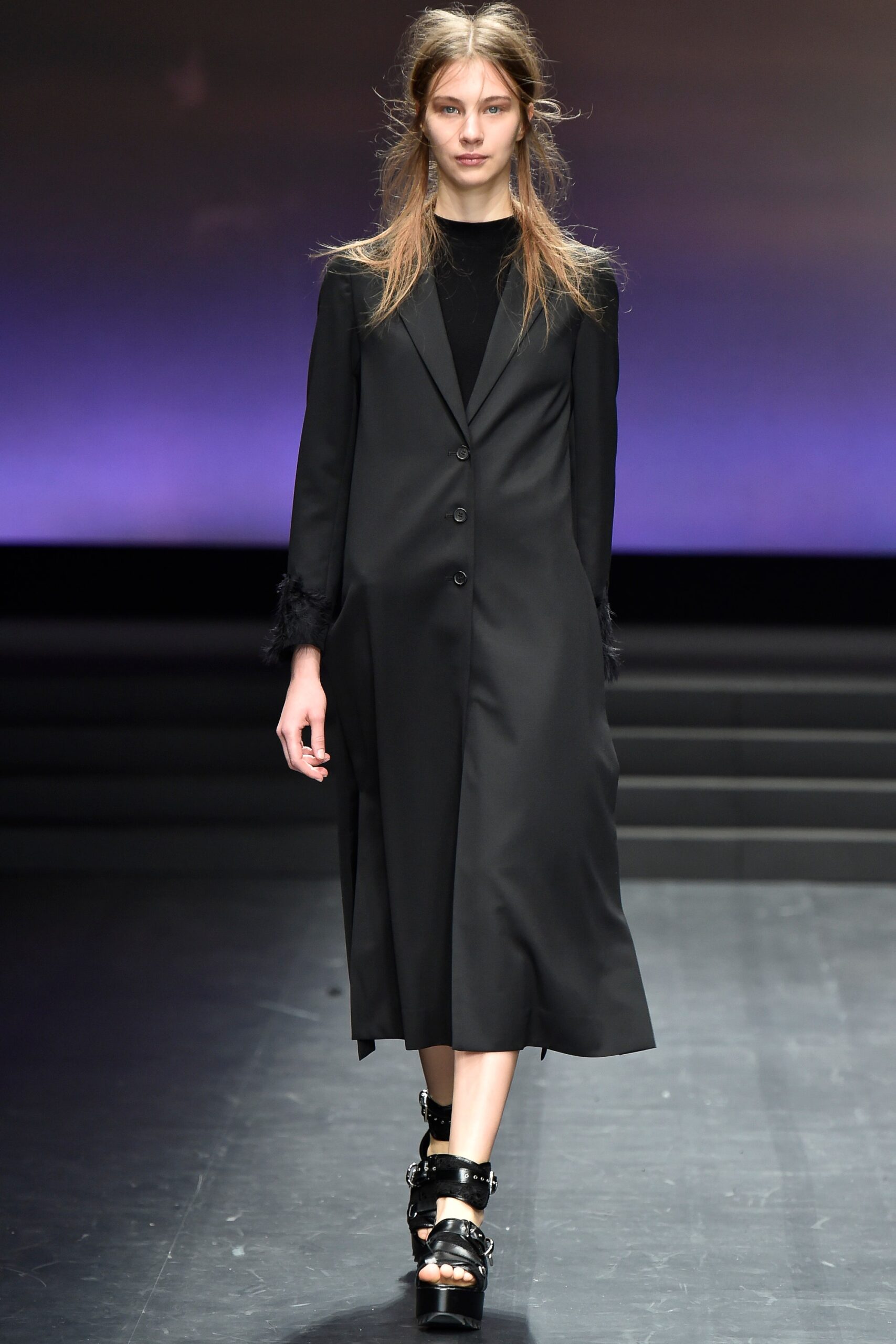 black blazer dress with feather cuffs