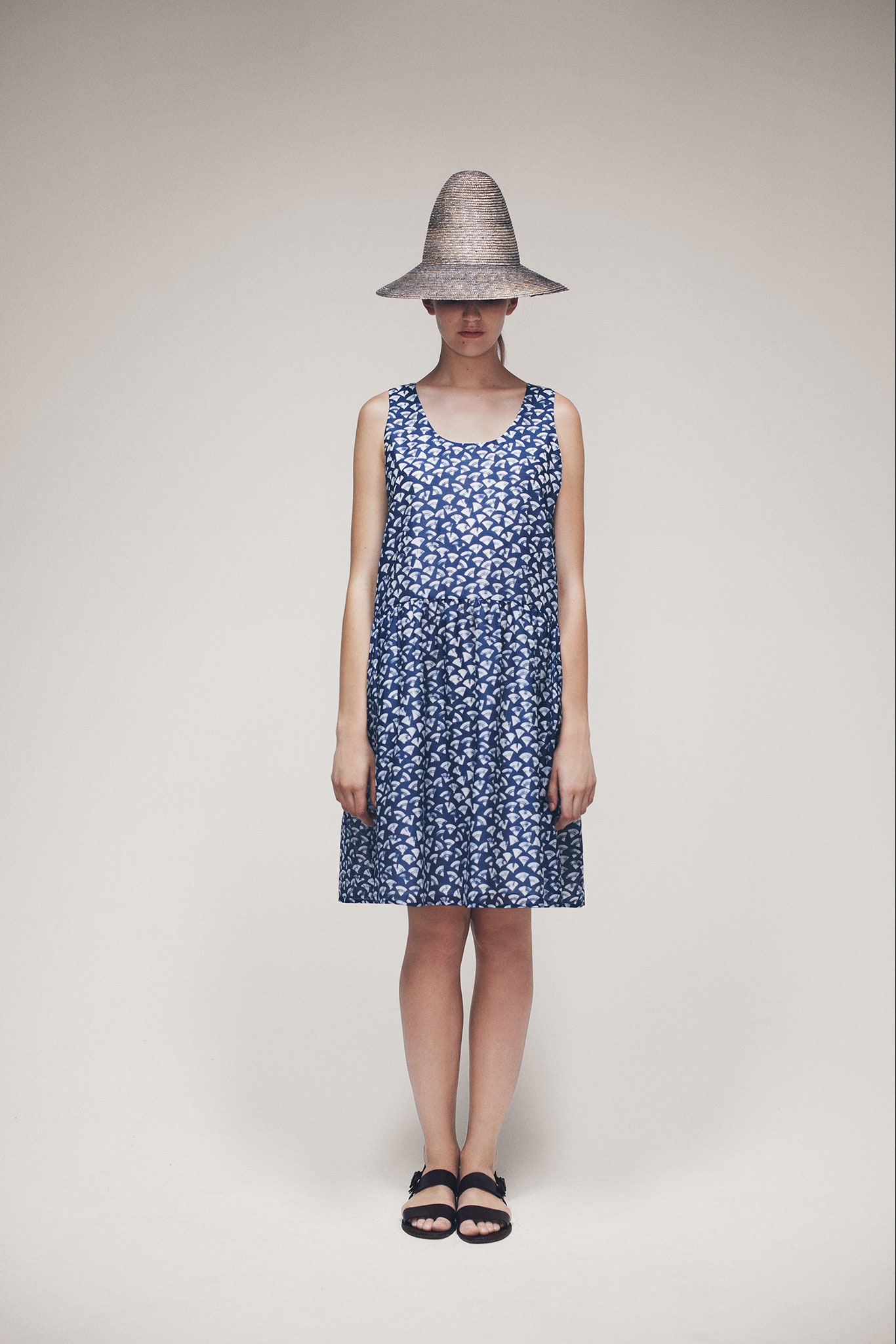 beige straw wide-brimmed textured hat