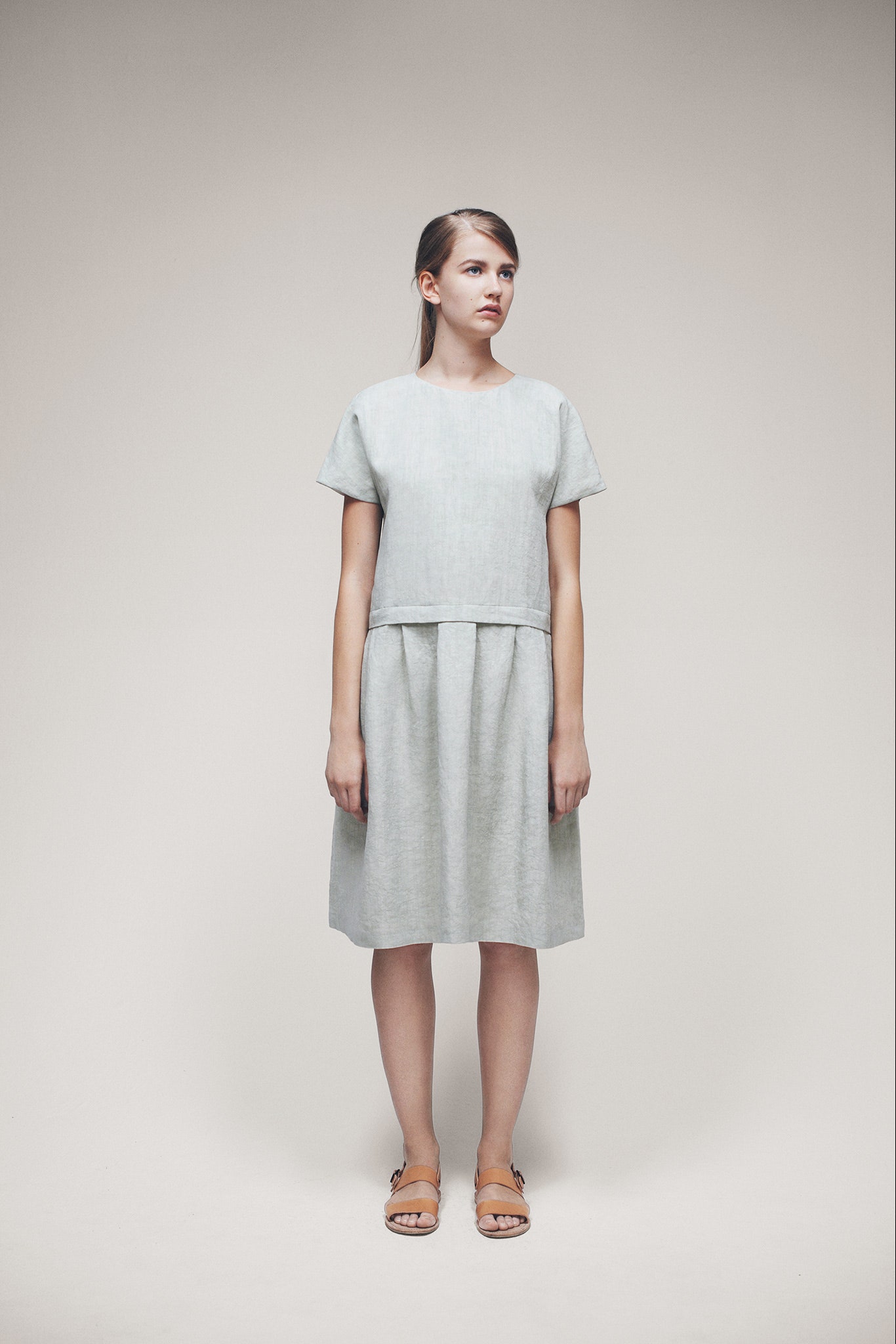 gray linen short-sleeve boat-neck relaxed pleated flowing midi-dress