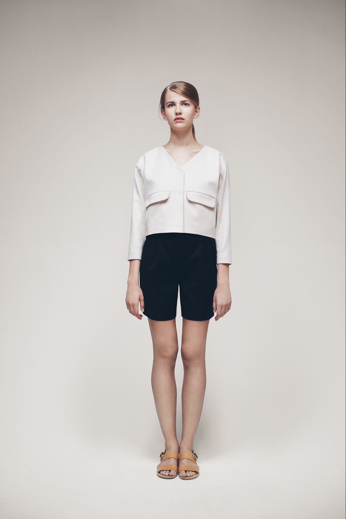 white unknown long-sleeve v-neck pockets cropped blouse