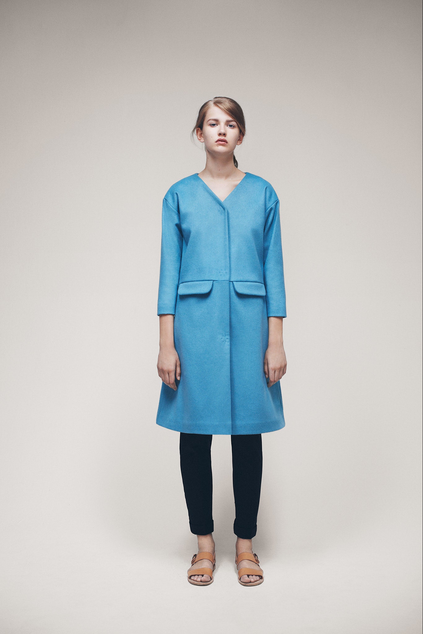 blue wool long-sleeve v-neck structured pockets midi coat