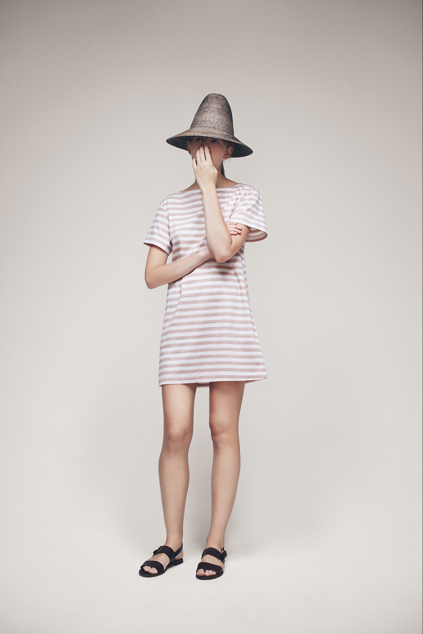 brown straw wide-brimmed textured hat