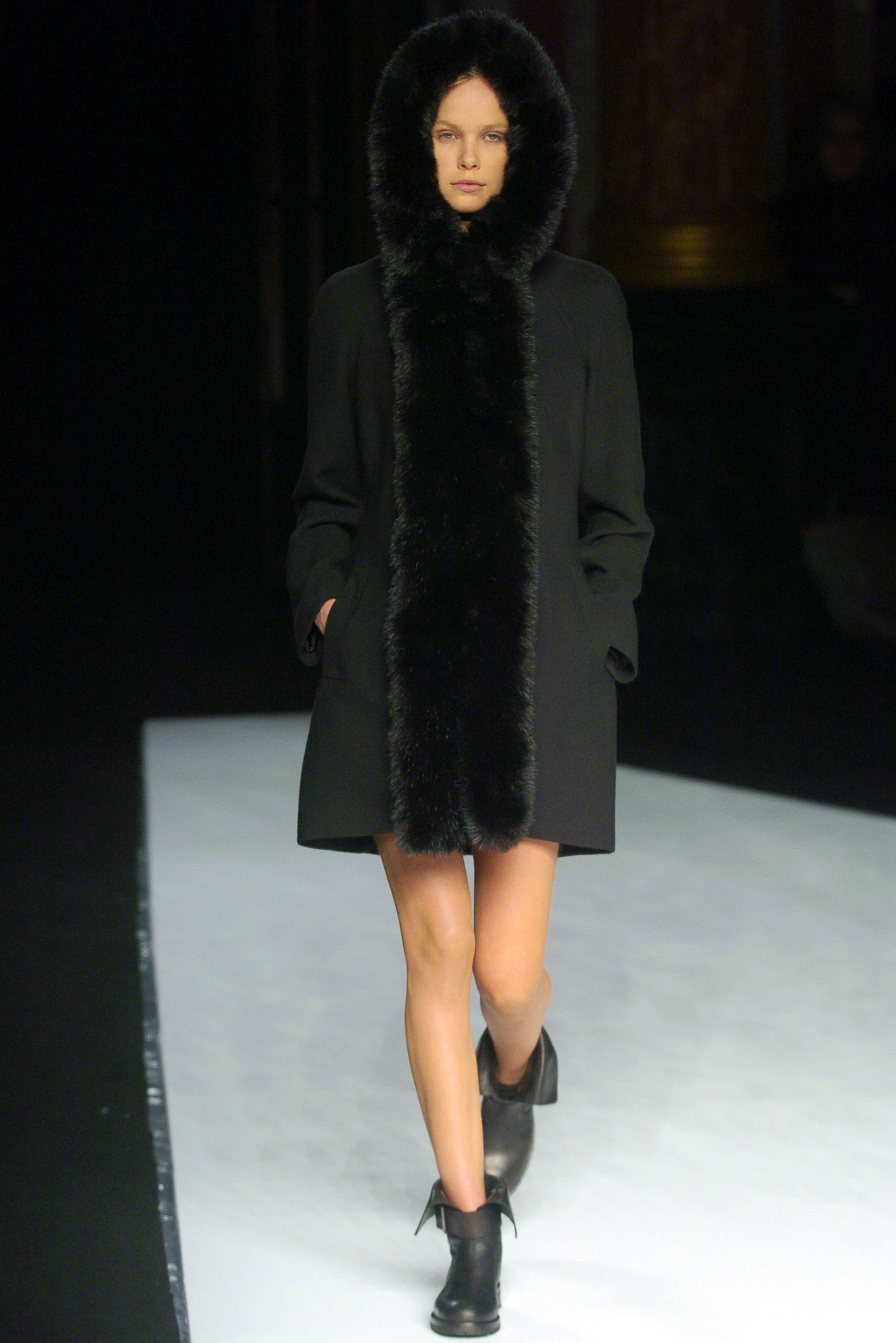 black fur-trimmed hooded coat