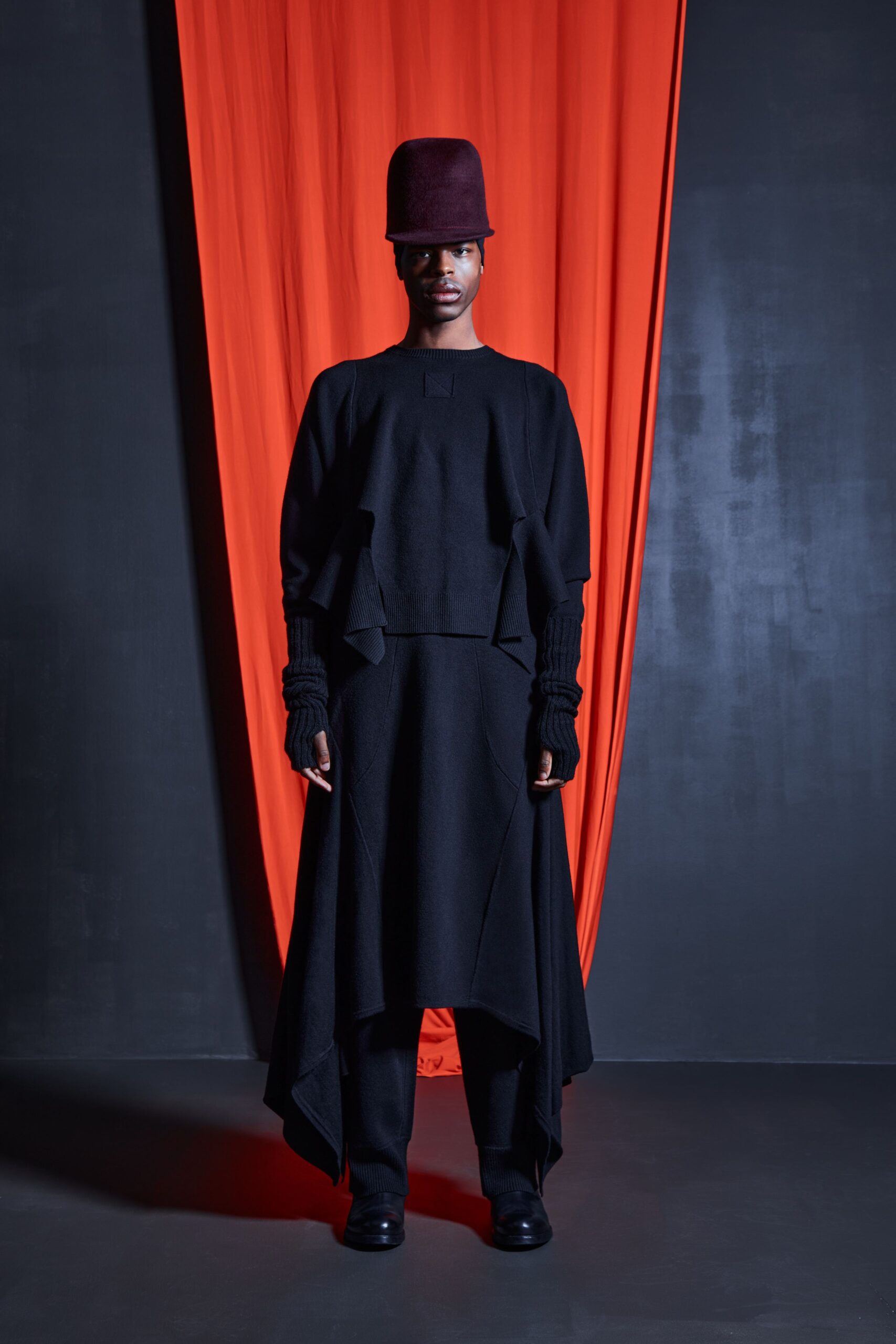 black wool relaxed top and skirt