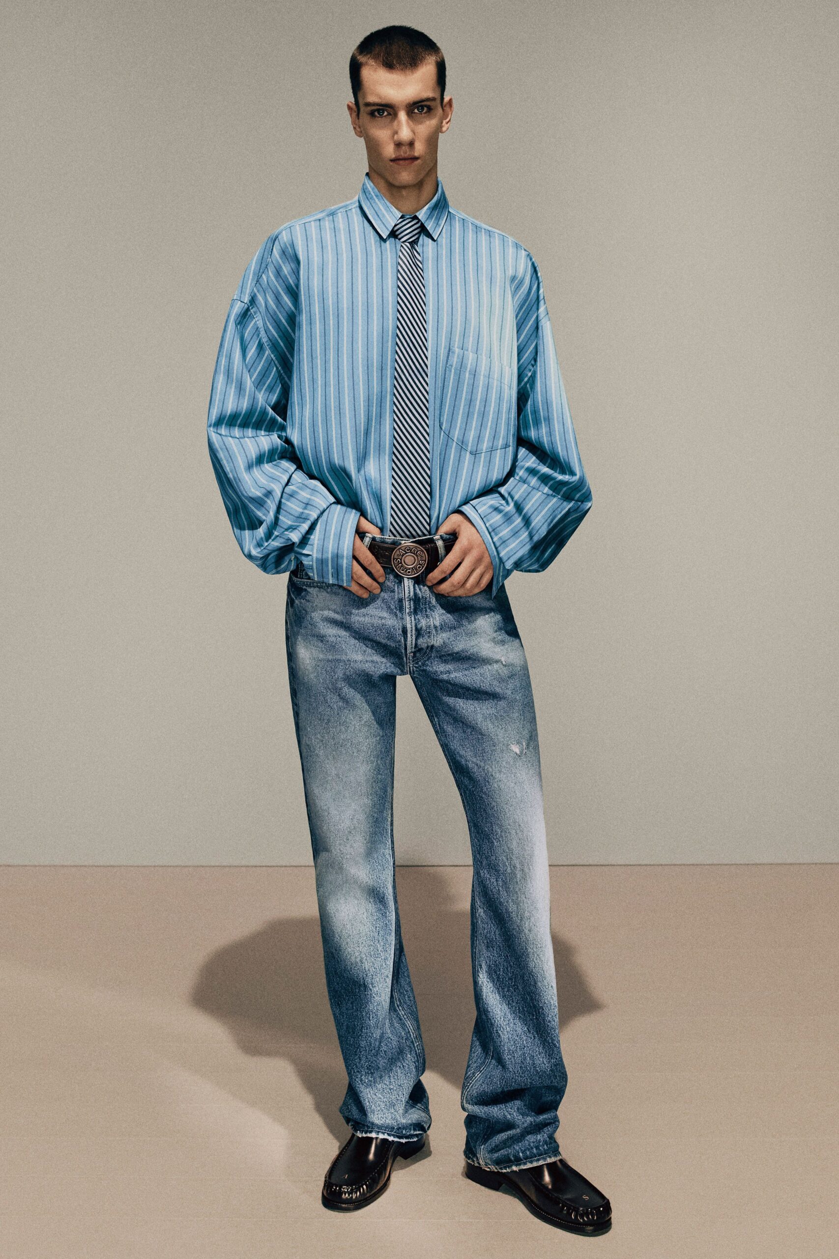 blue striped shirt and jeans