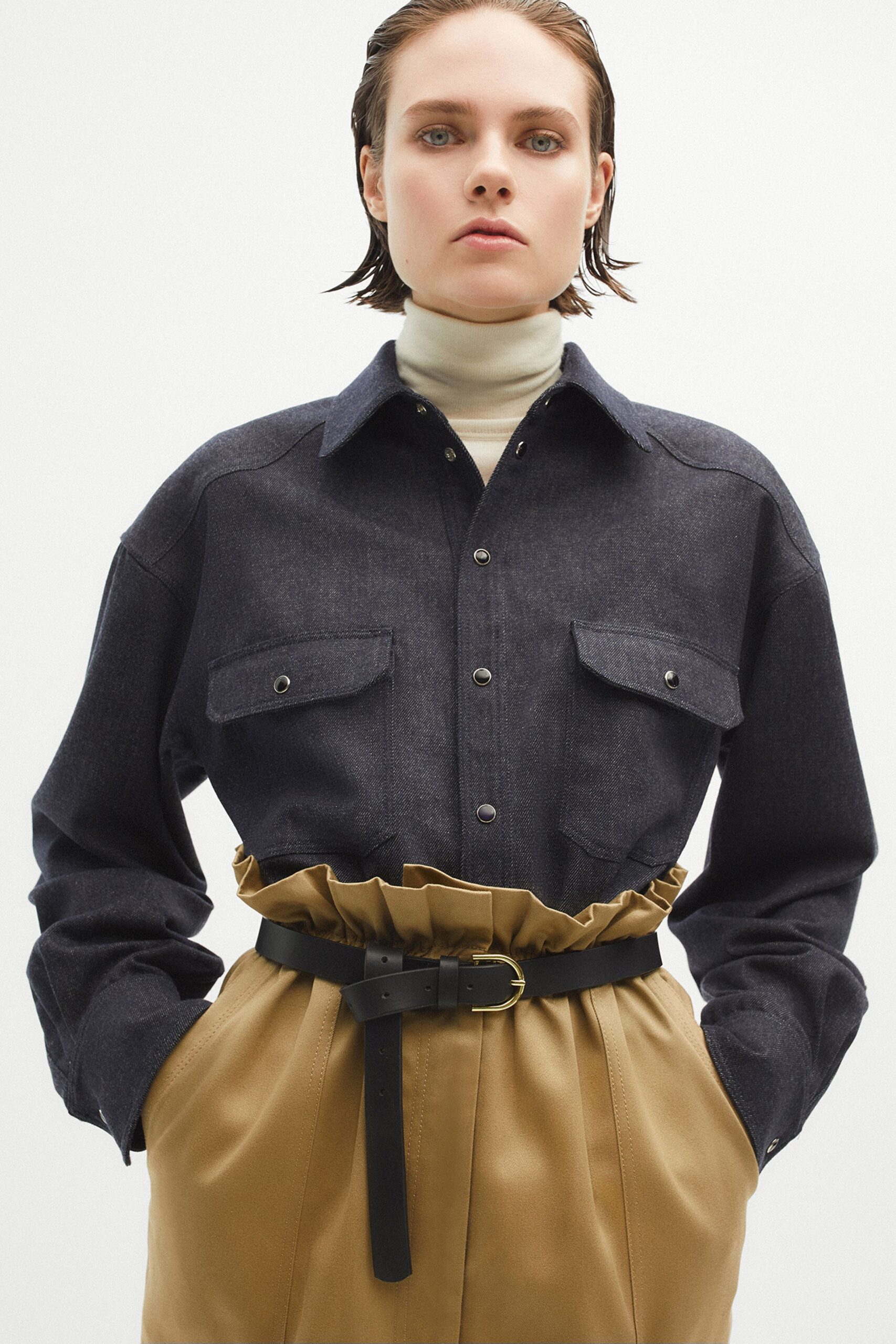 beige cotton fitted high-waisted pleated belted pants