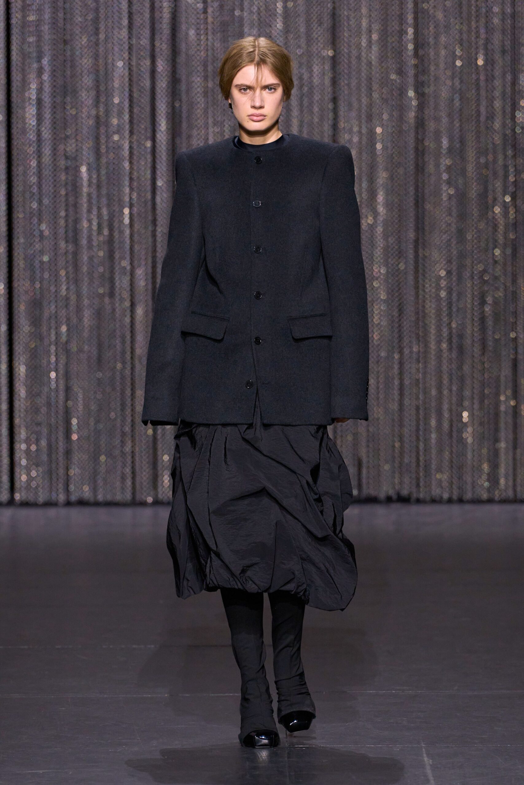 black wool blazer with pleated skirt