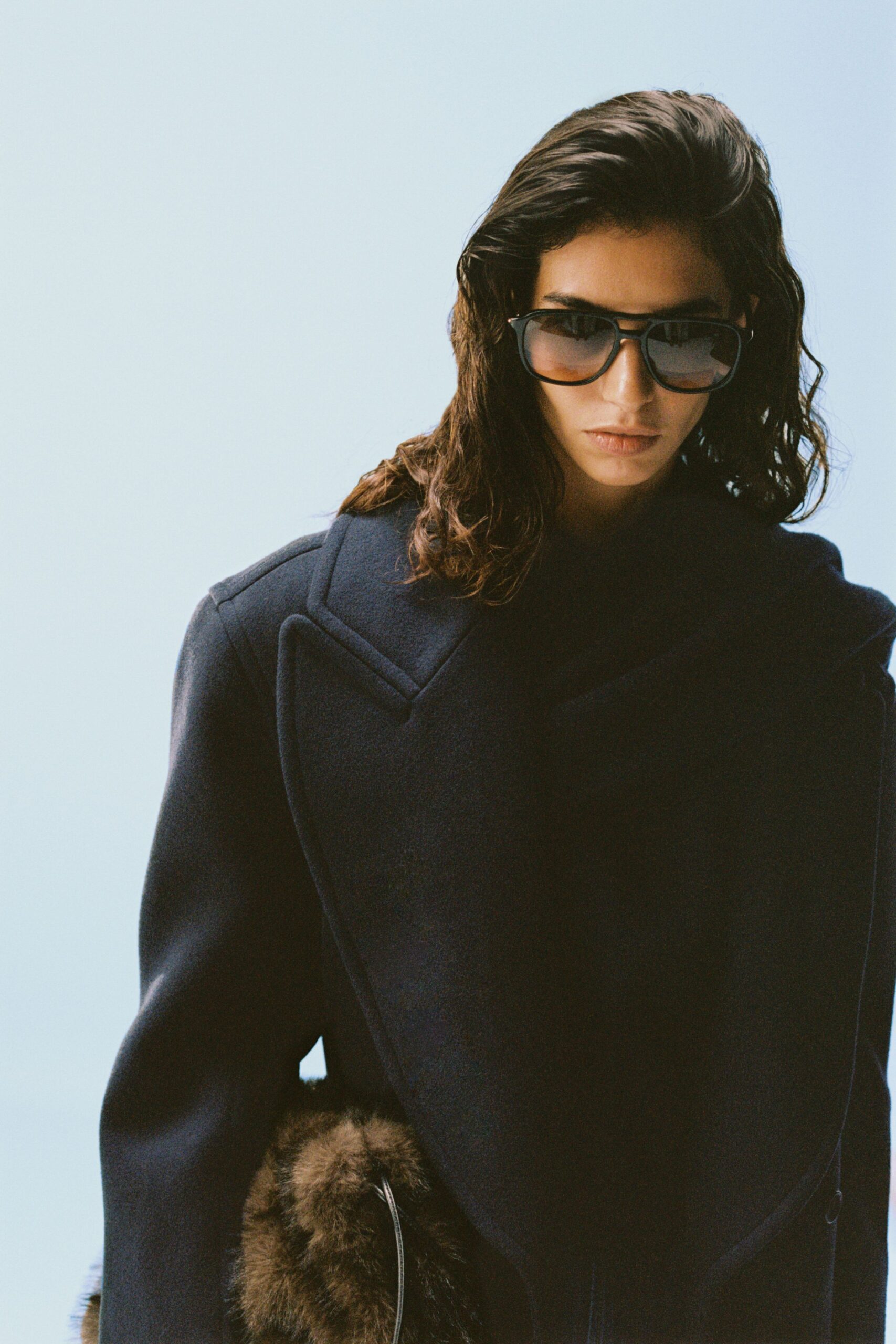 black wool long-sleeve high-neck structured pockets textured coat