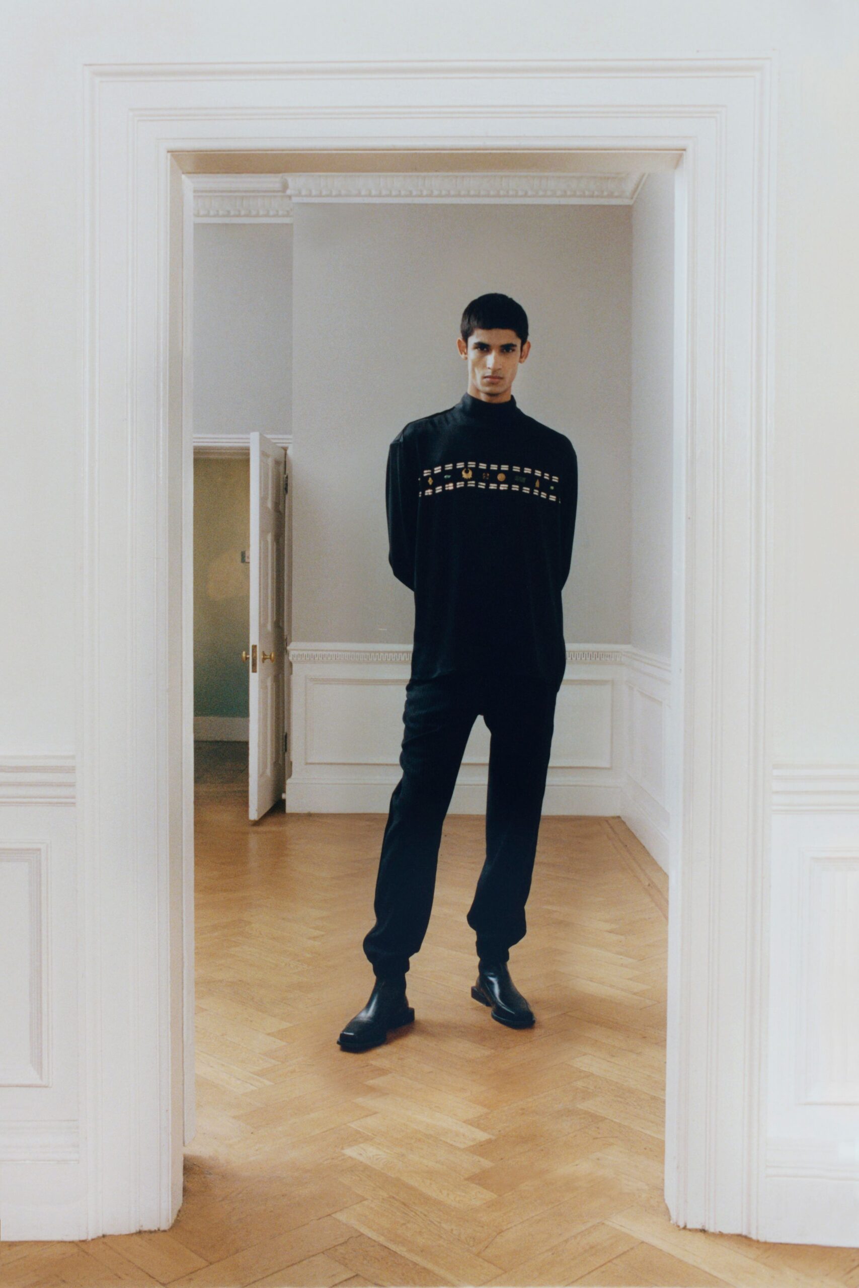 black fitted top with relaxed pants