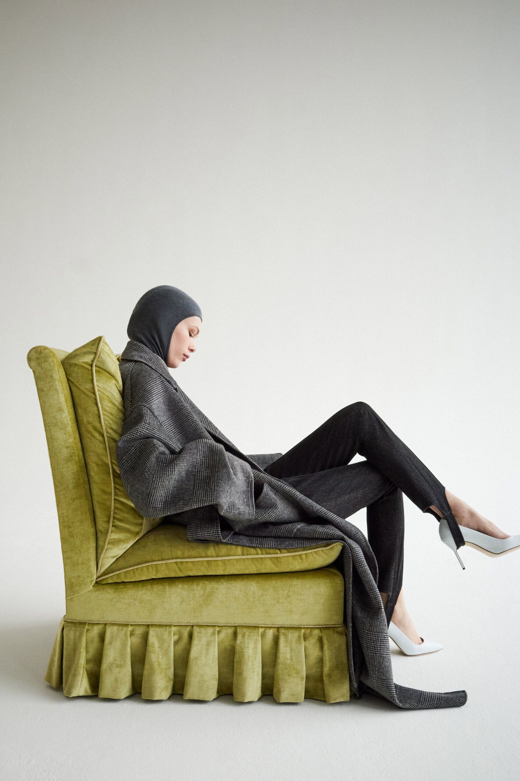 gray wool relaxed coat with black pants
