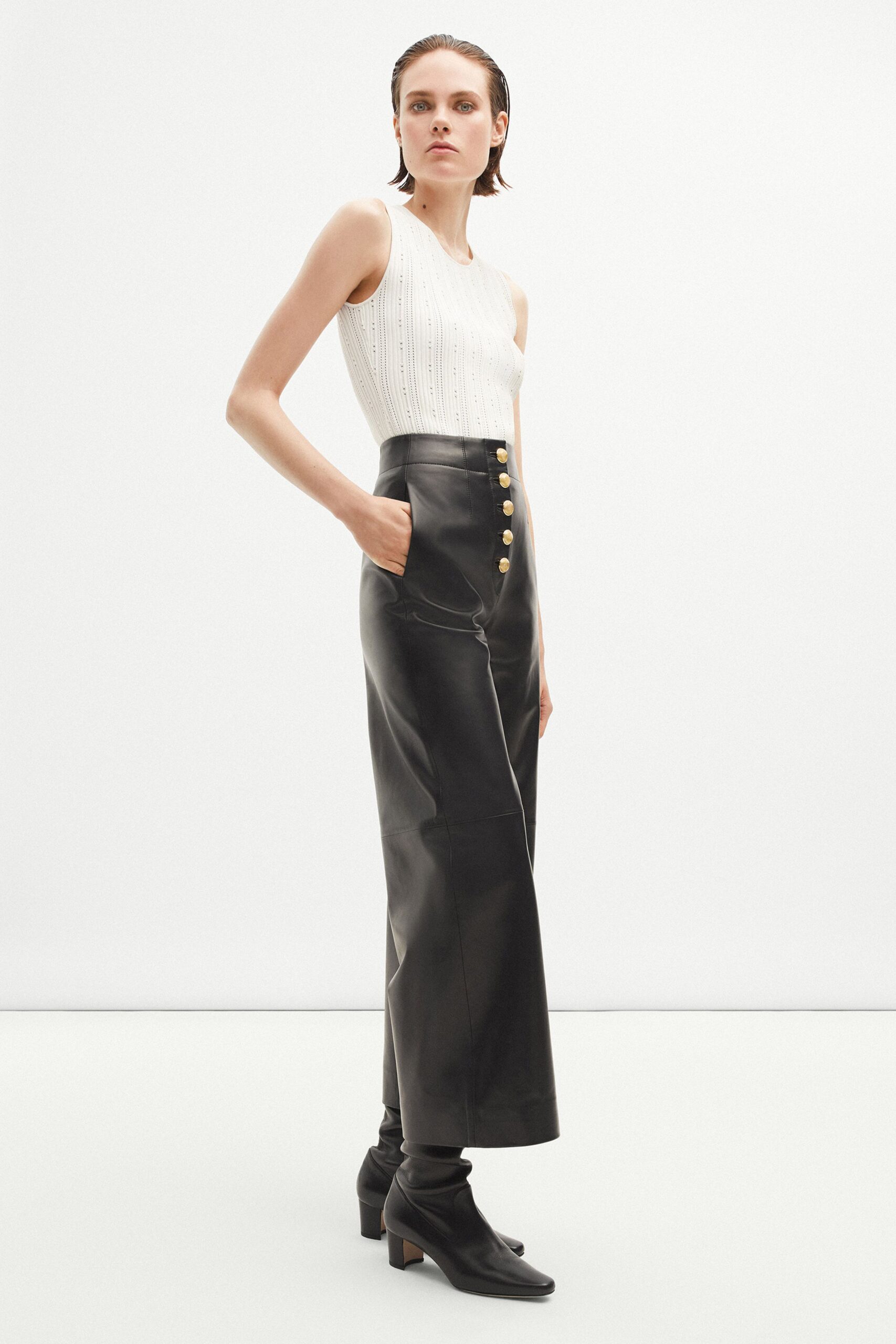 black leather fitted high-waisted buttoned straight-leg skirt